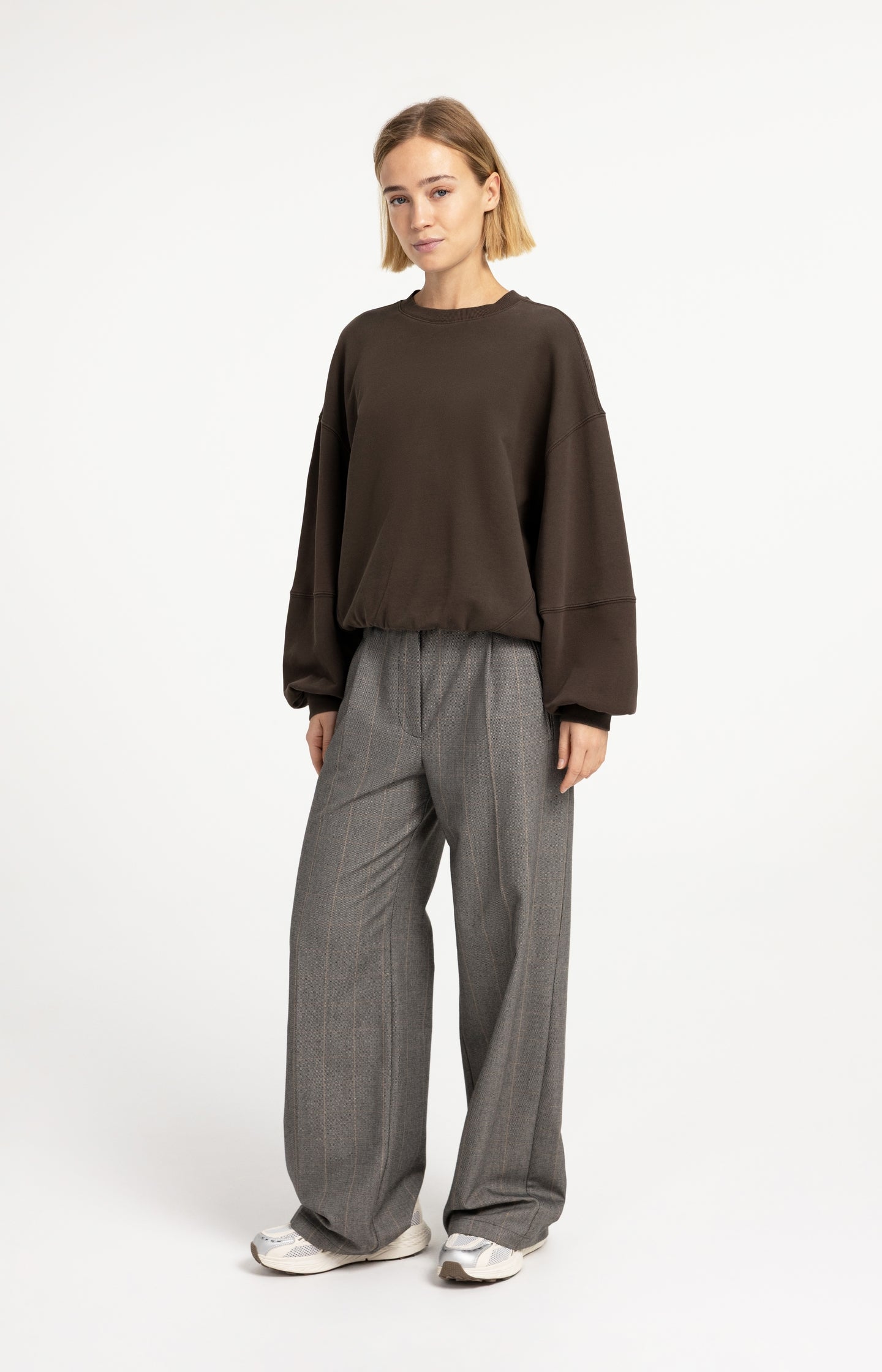 Oversized sweater with balloon sleeves and washed finish