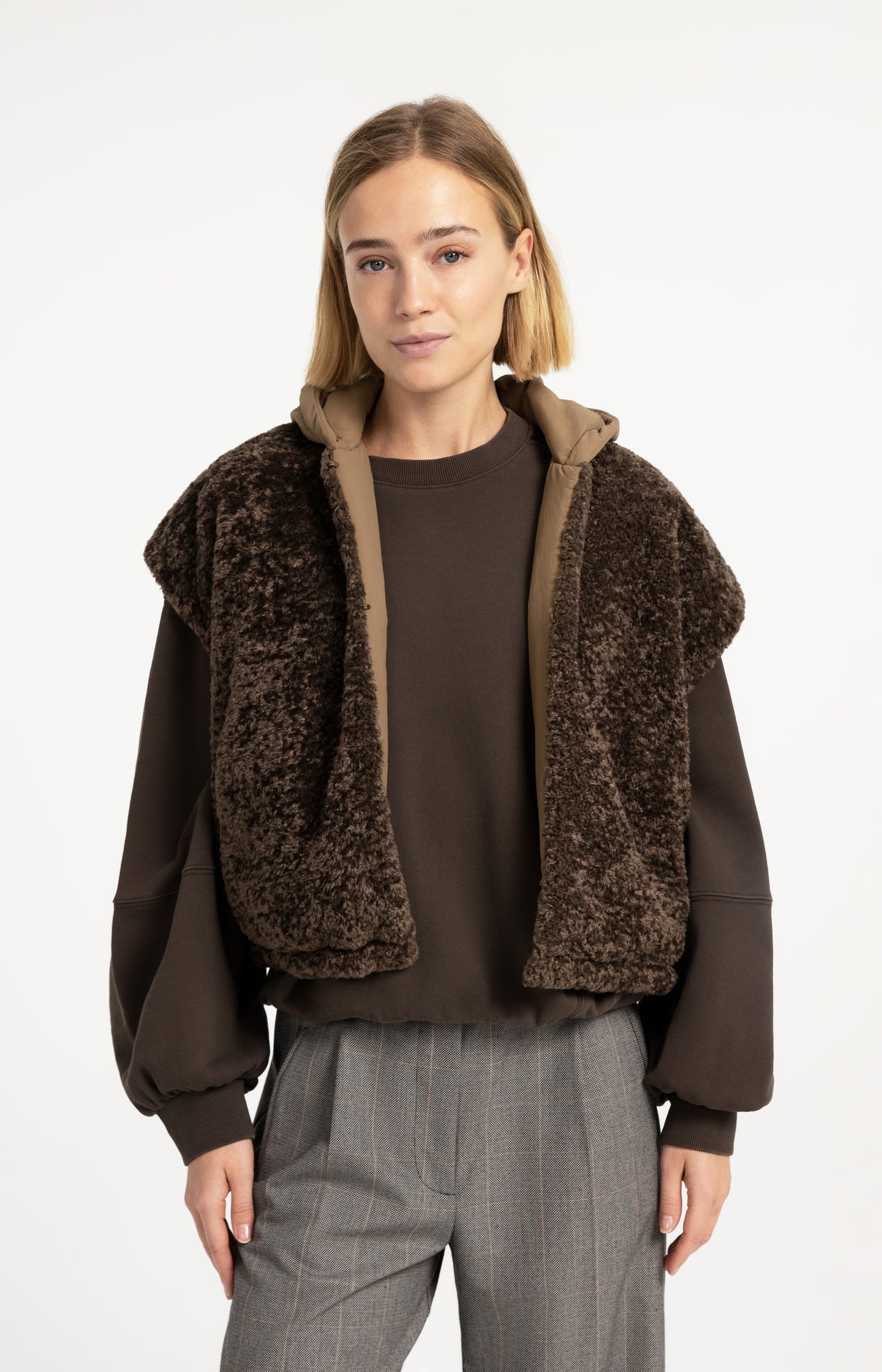 Reversible bodywarmer with hood