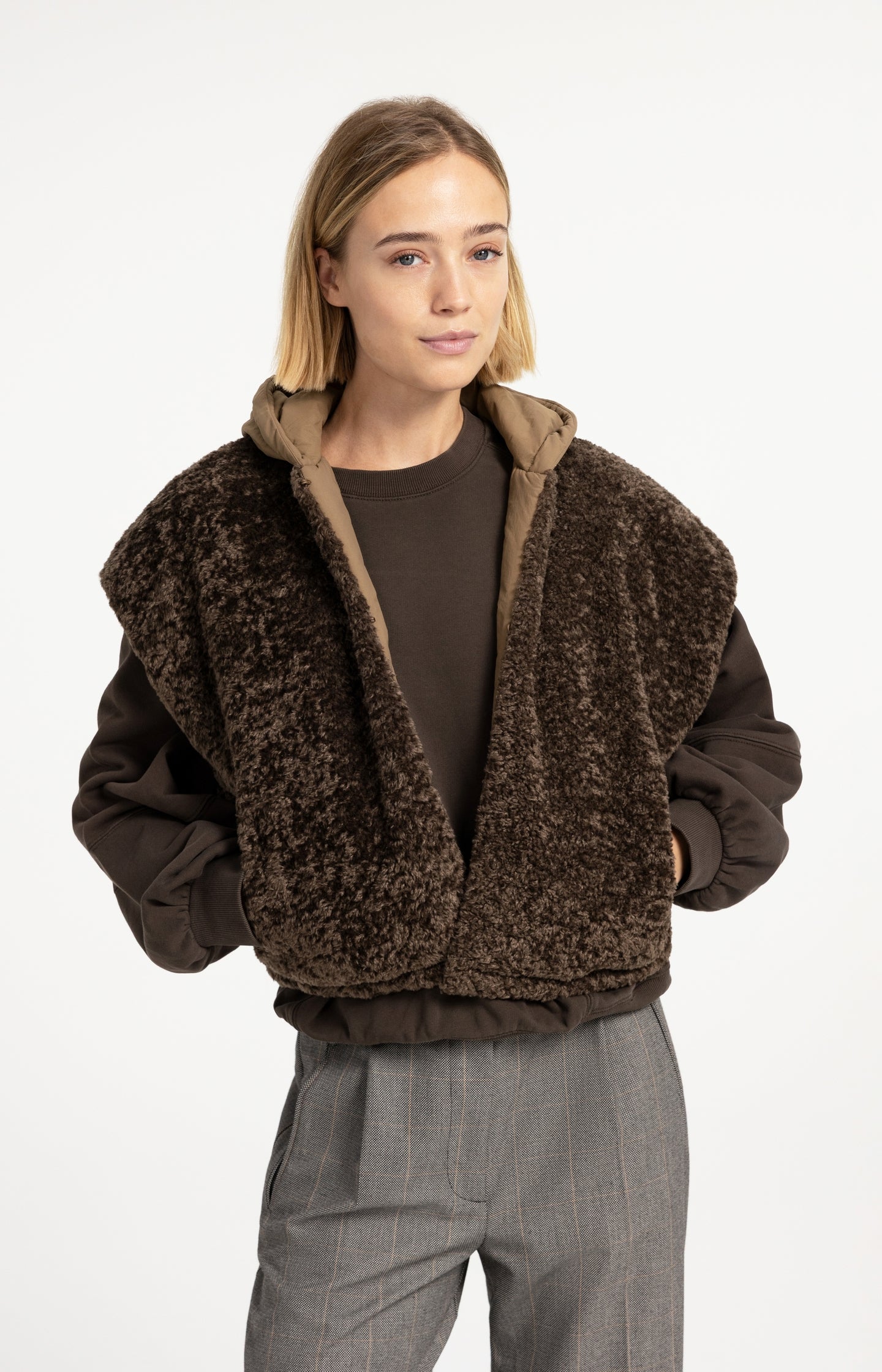 Reversible bodywarmer with hood