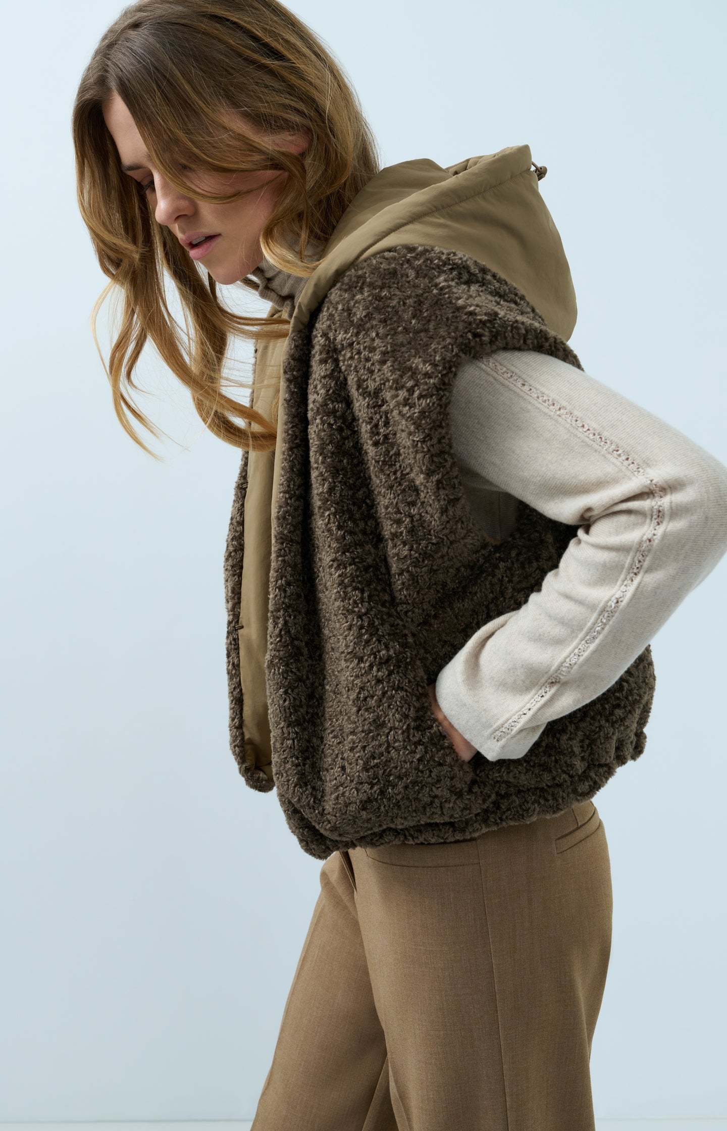Reversible bodywarmer with hood
