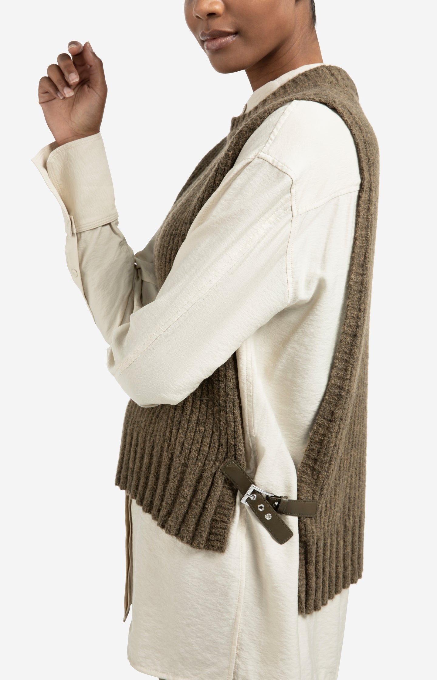 Ribbed sleeveless sweater with side buckles