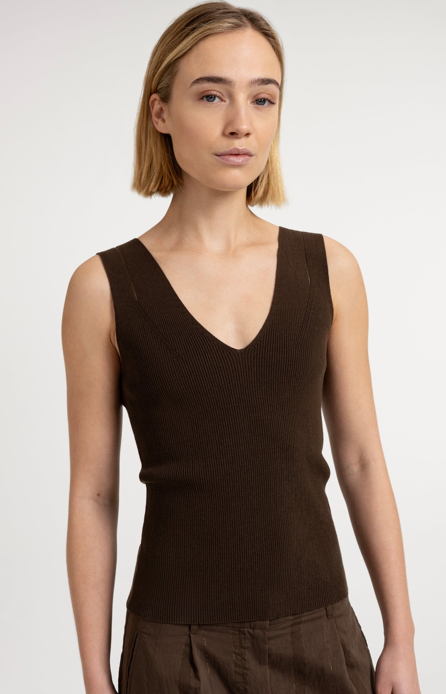 Ribbed top with V-neck and shoulder details
