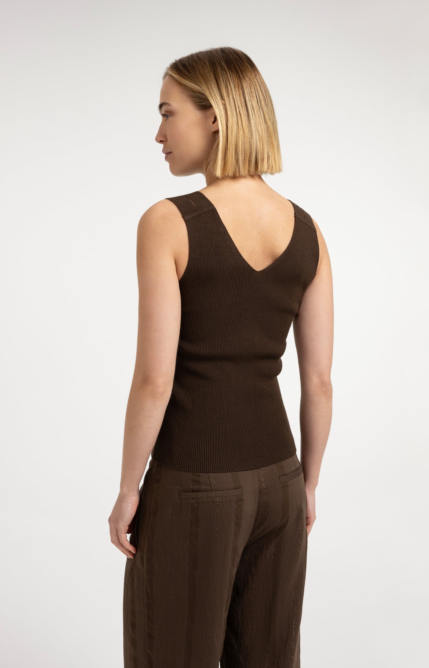 Ribbed top with V-neck and shoulder details