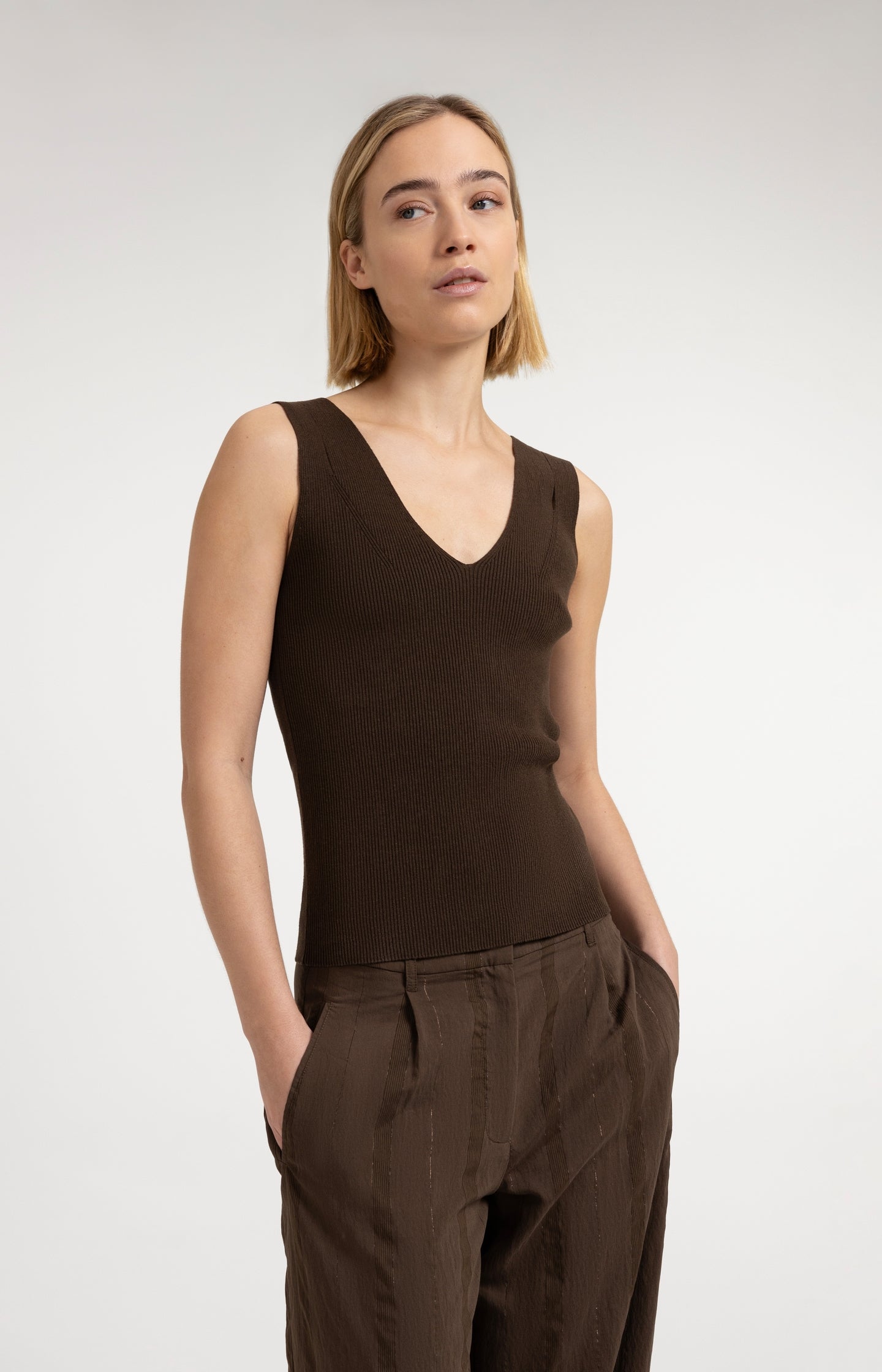 Ribbed top with V-neck and shoulder details