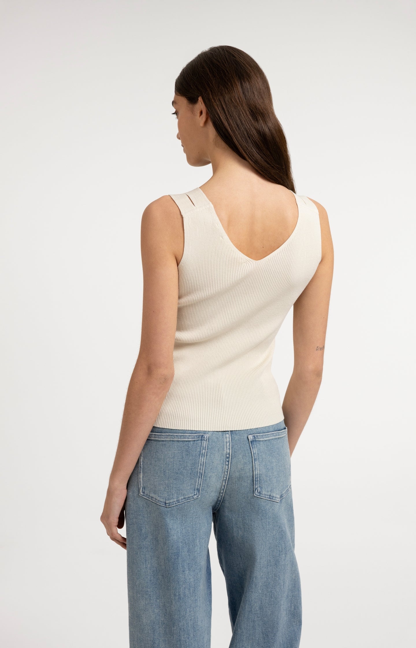 Ribbed top with V-neck and shoulder details