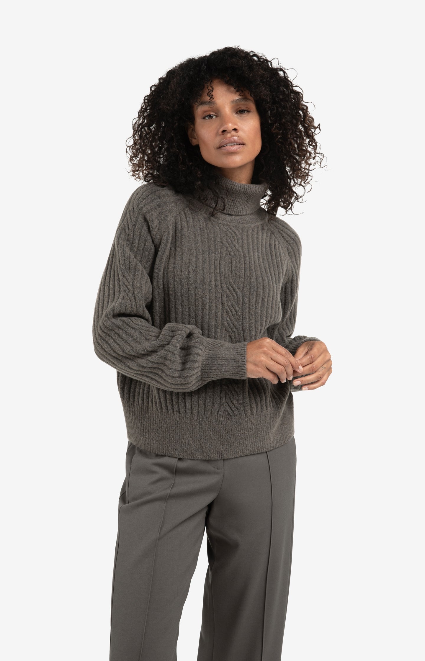Ribbed turtleneck sweater with cable detail and long sleeves