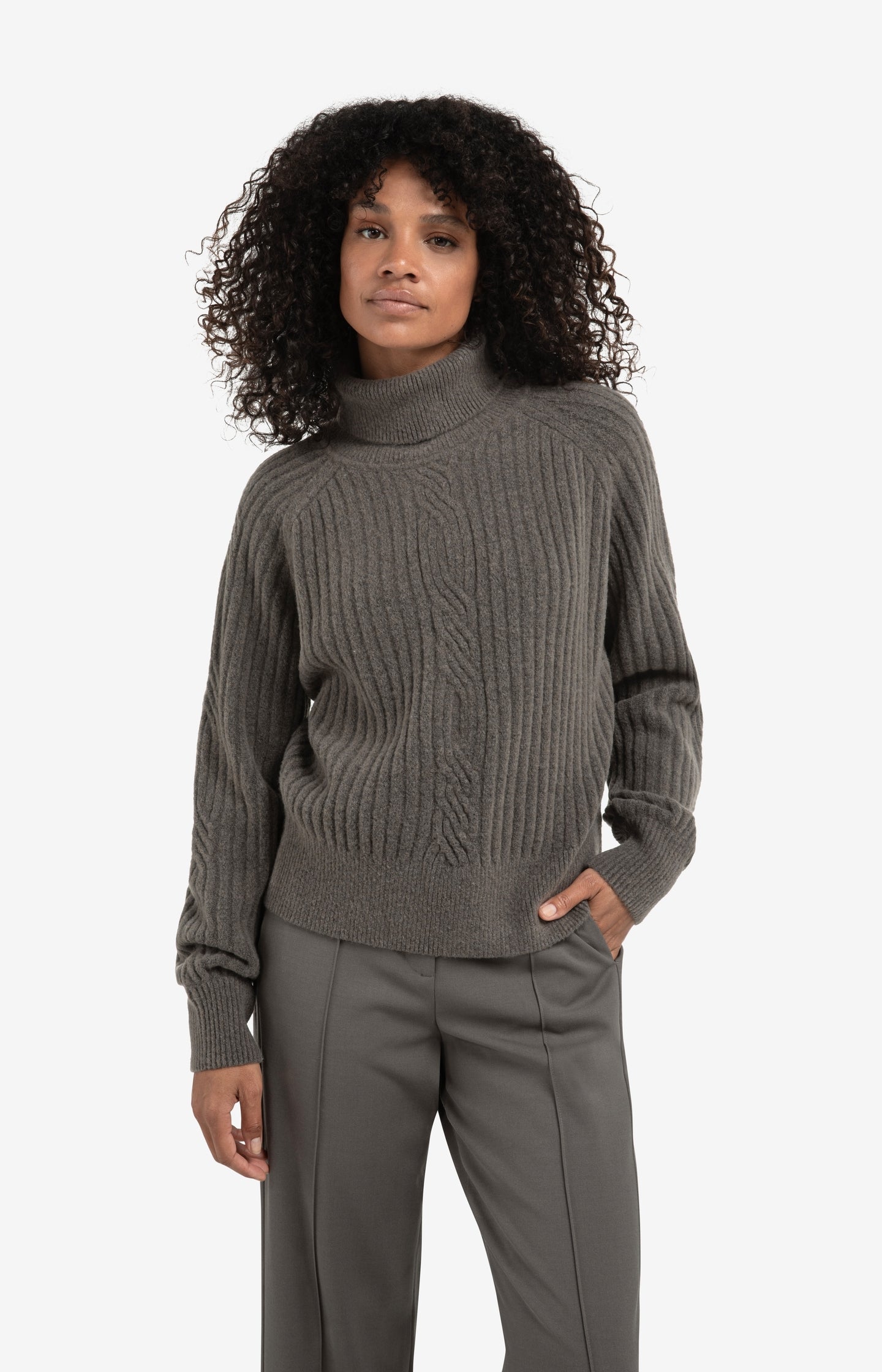 Ribbed turtleneck sweater with cable detail and long sleeves