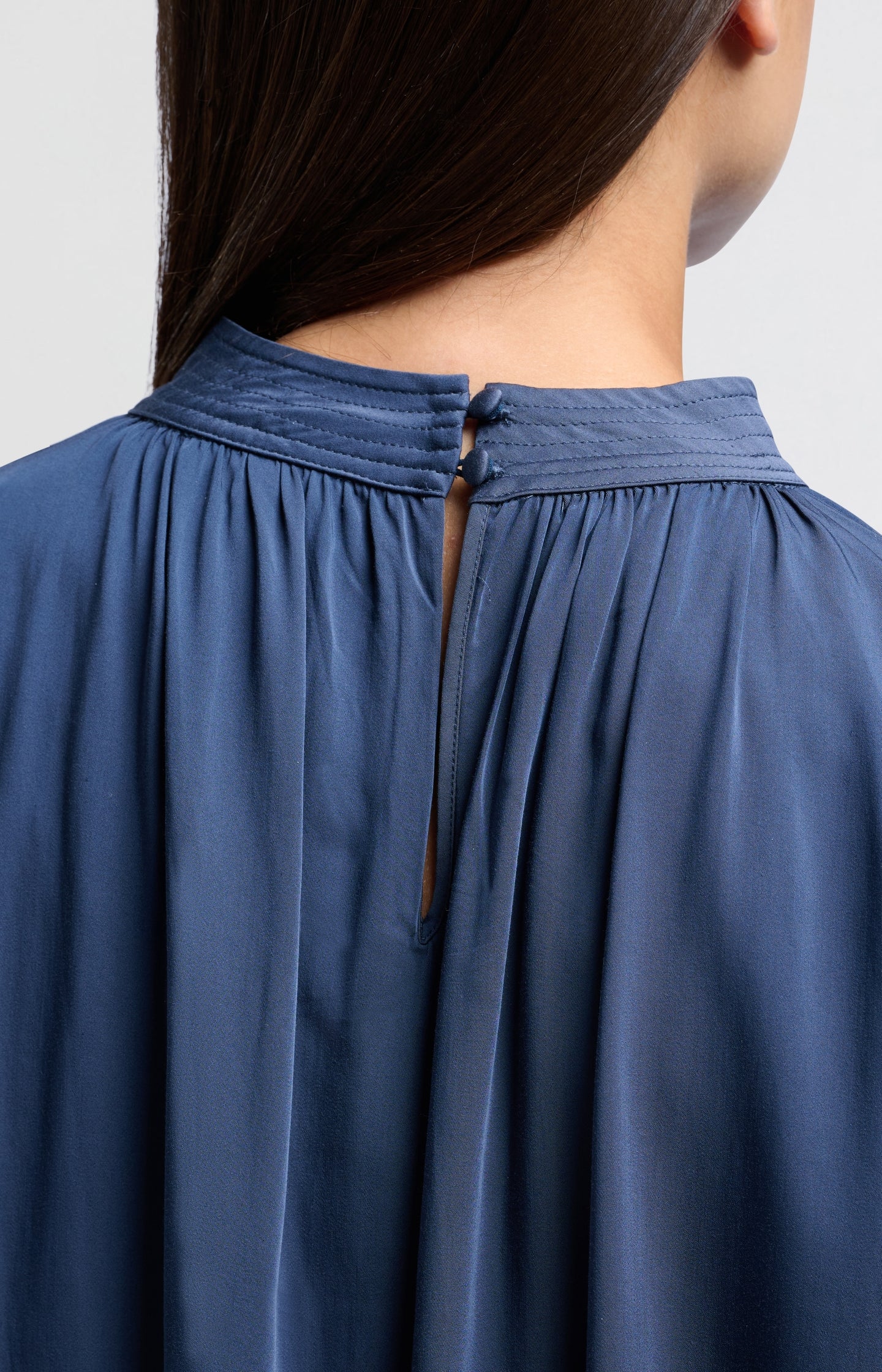 Satin blouse with long sleeves, pleat detail and high neck