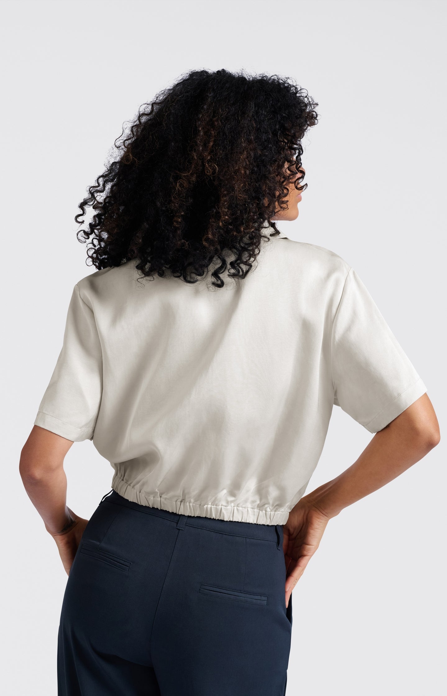 Satin short-sleeve jacket with zipper closure