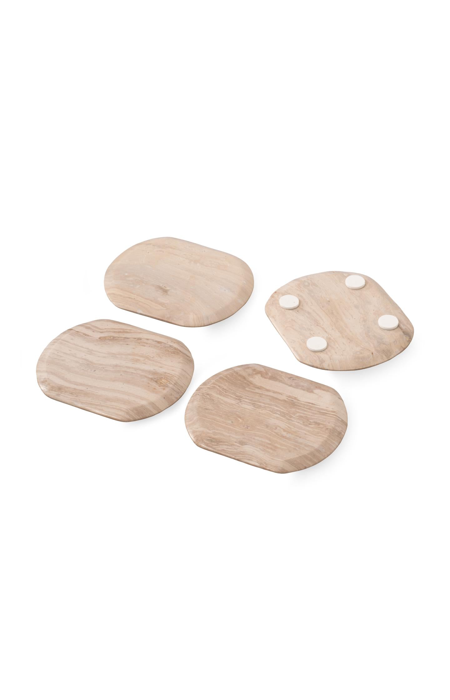 Set of four oval marble coasters