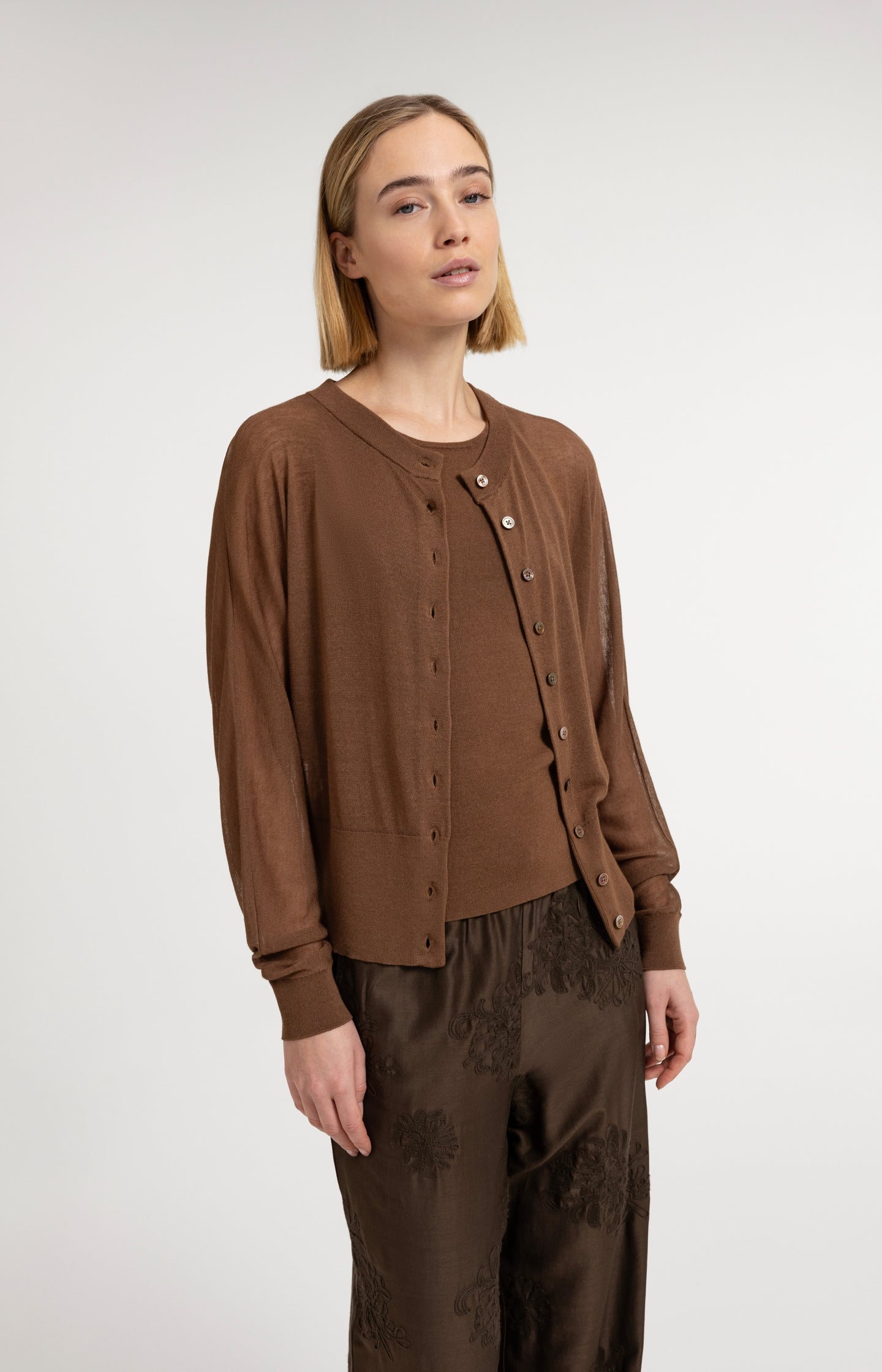 Sheer cardigan with batwing sleeves and tank top