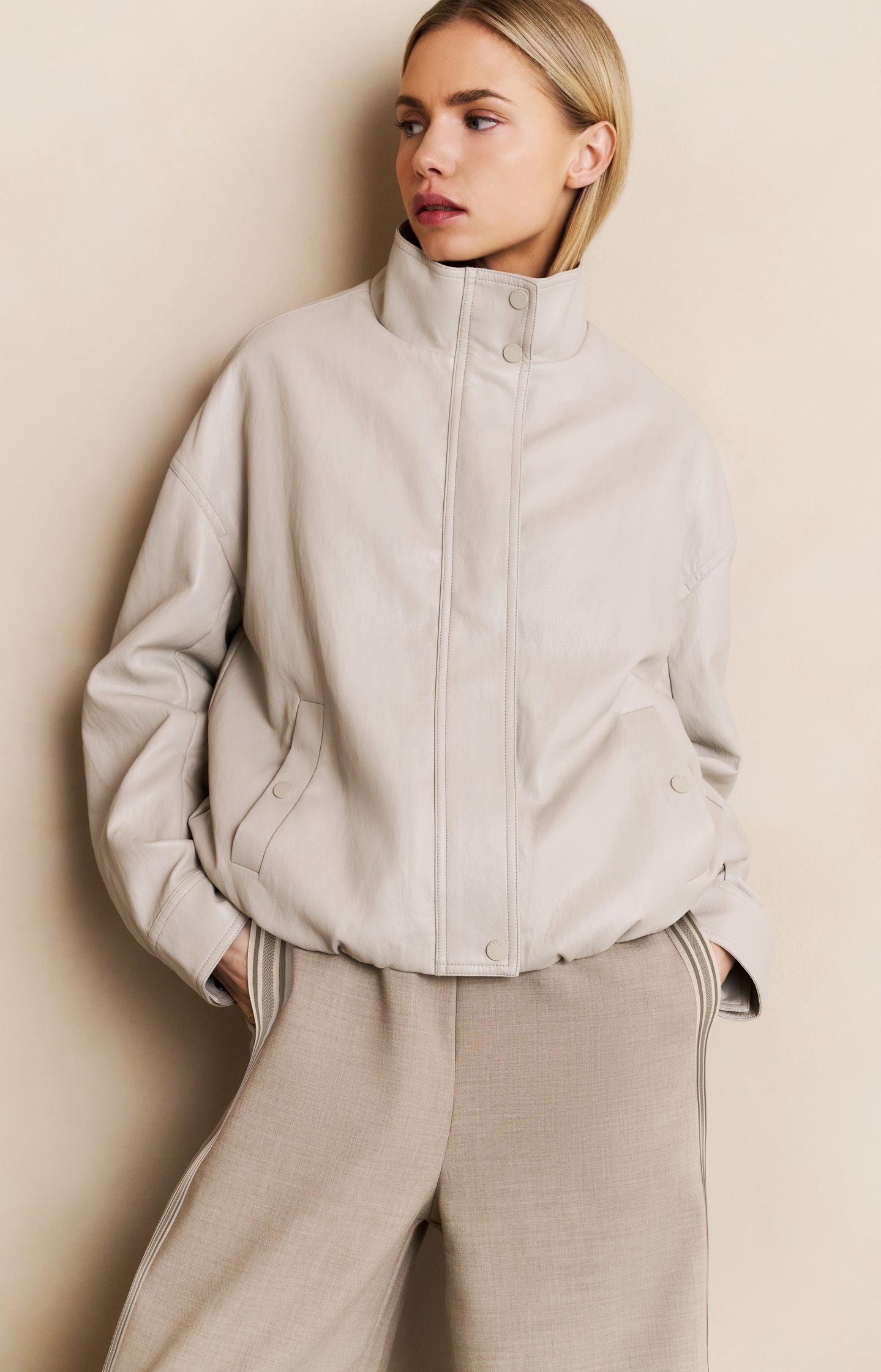 Short faux leather jacket with elastic hem