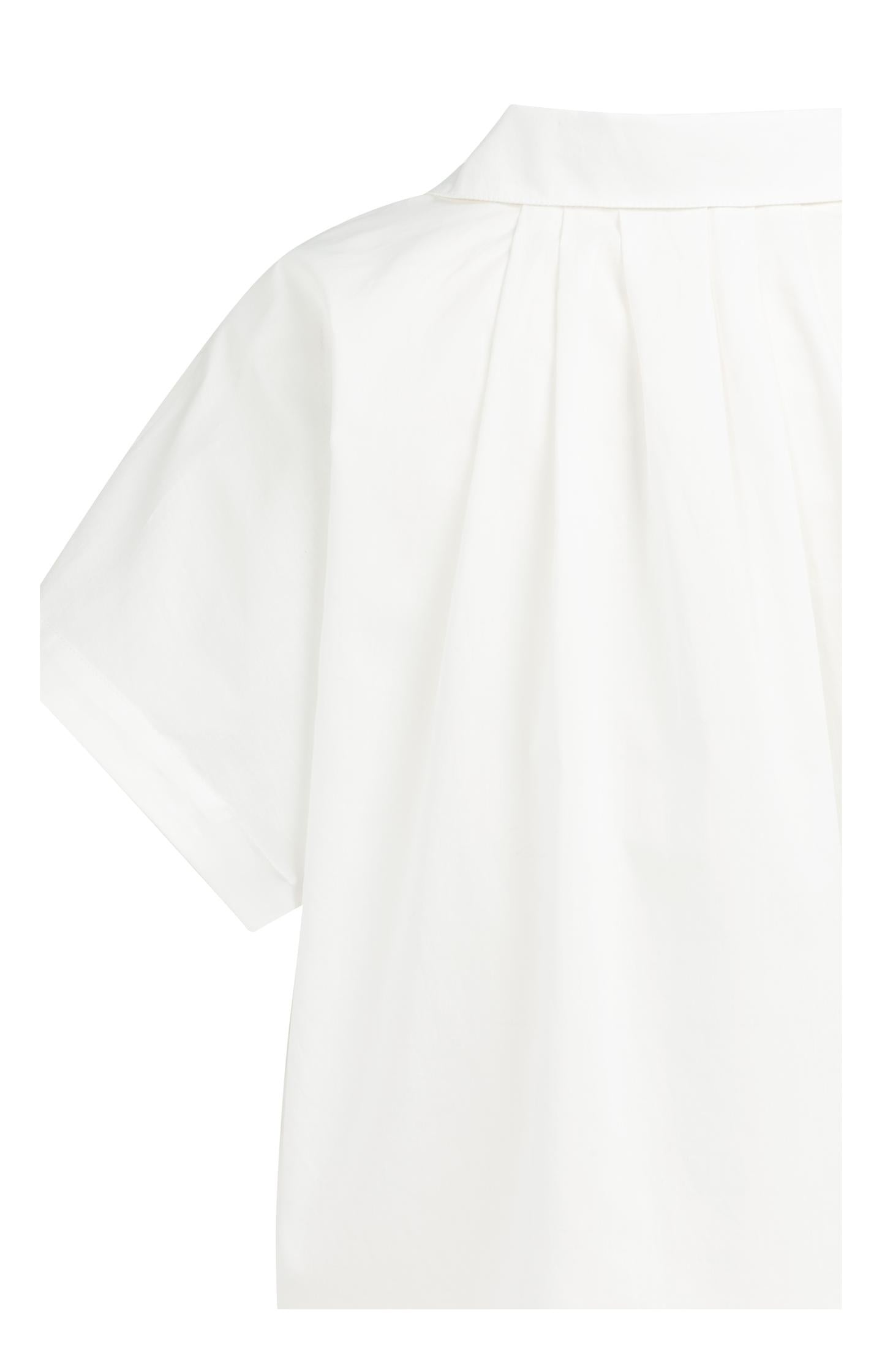 Sleeveless blouse with button details