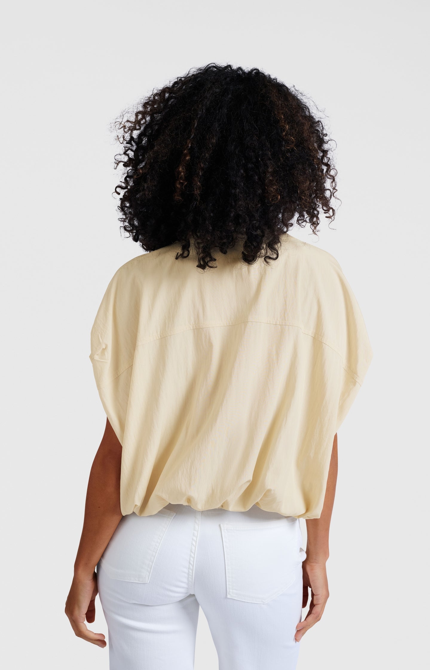 Sleeveless blouse with elastic waist