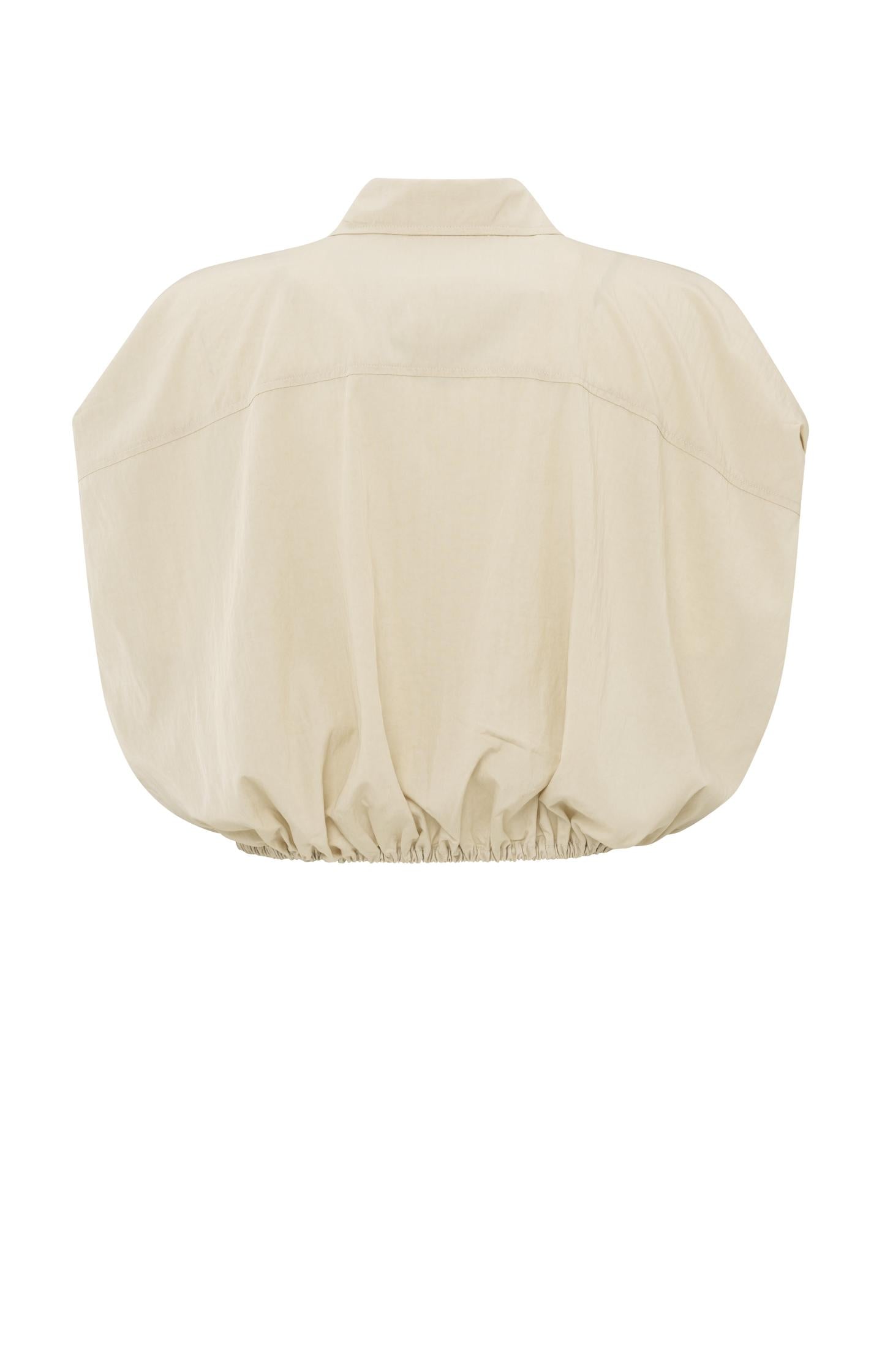 Sleeveless blouse with elastic waist