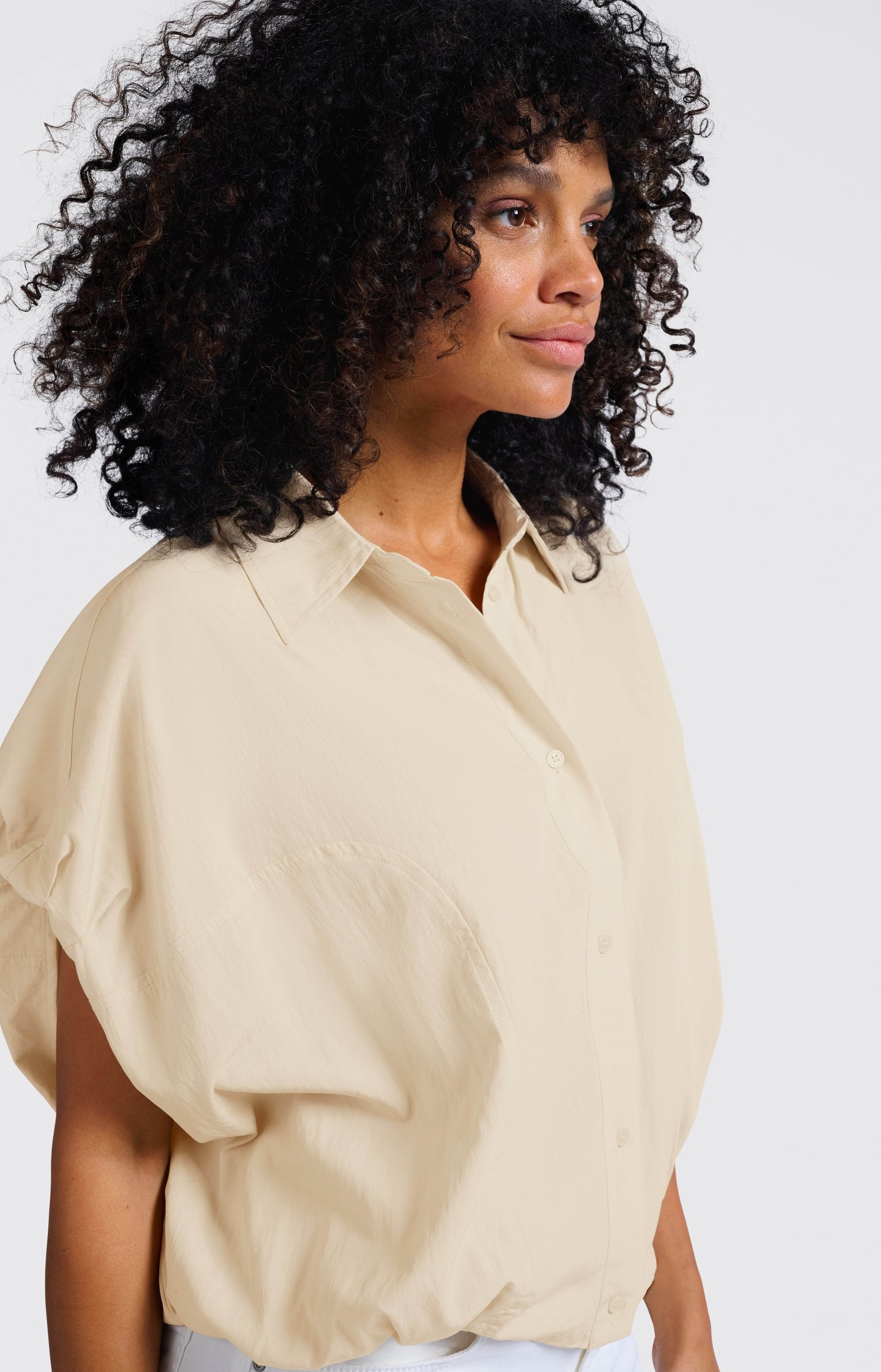 Sleeveless blouse with elastic waist