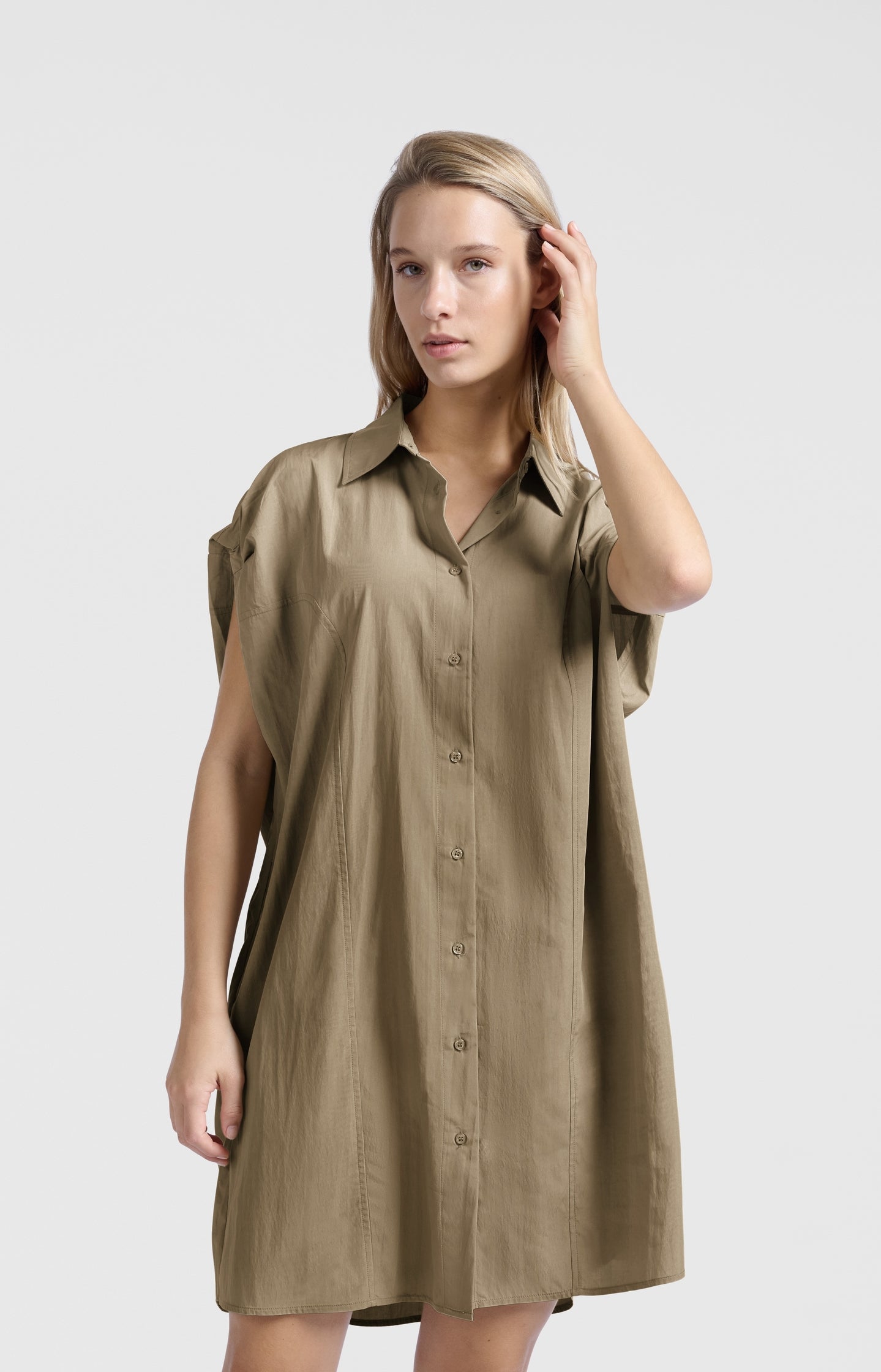 Sleeveless dress with decorative seams