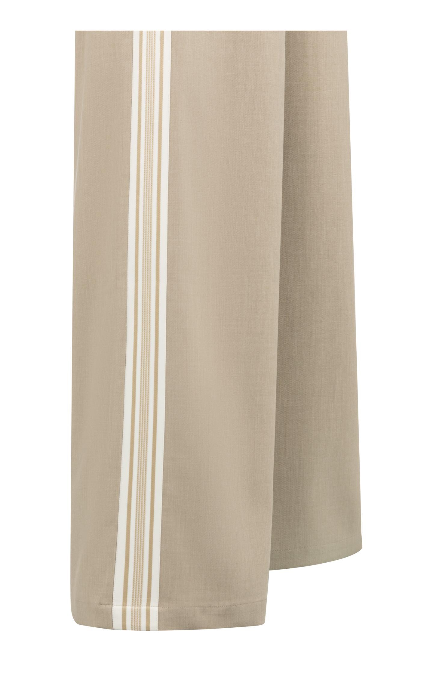Sleeveless jumpsuit with wide legs and sporty stripe