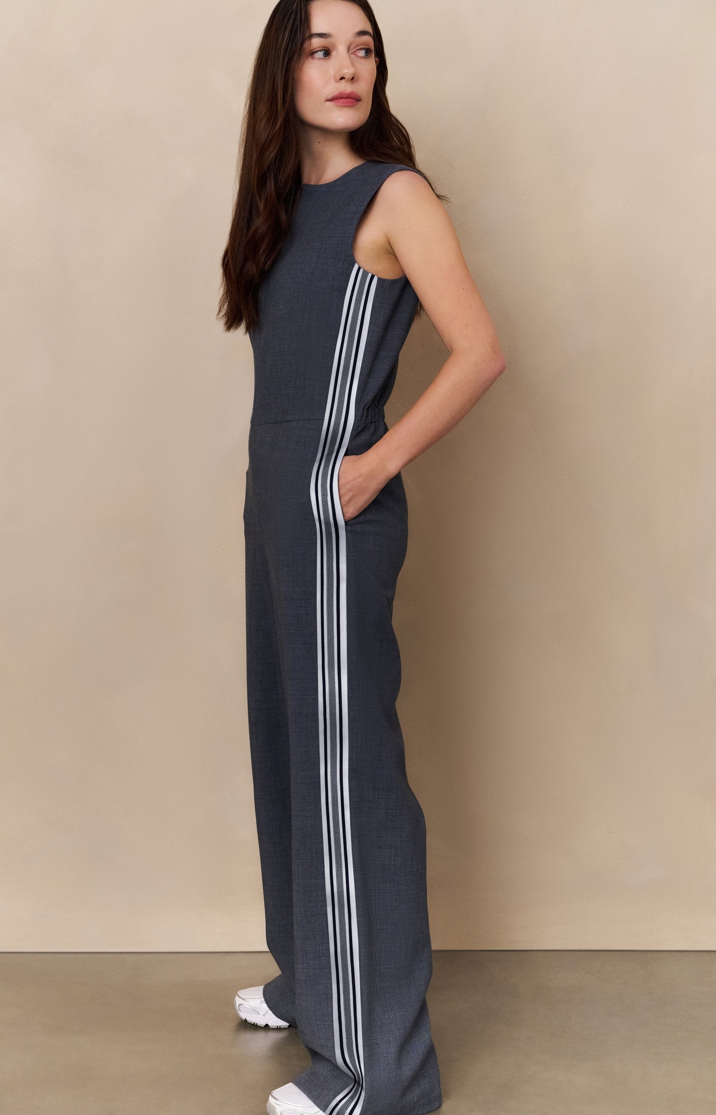 Sleeveless jumpsuit with wide legs and sporty stripe