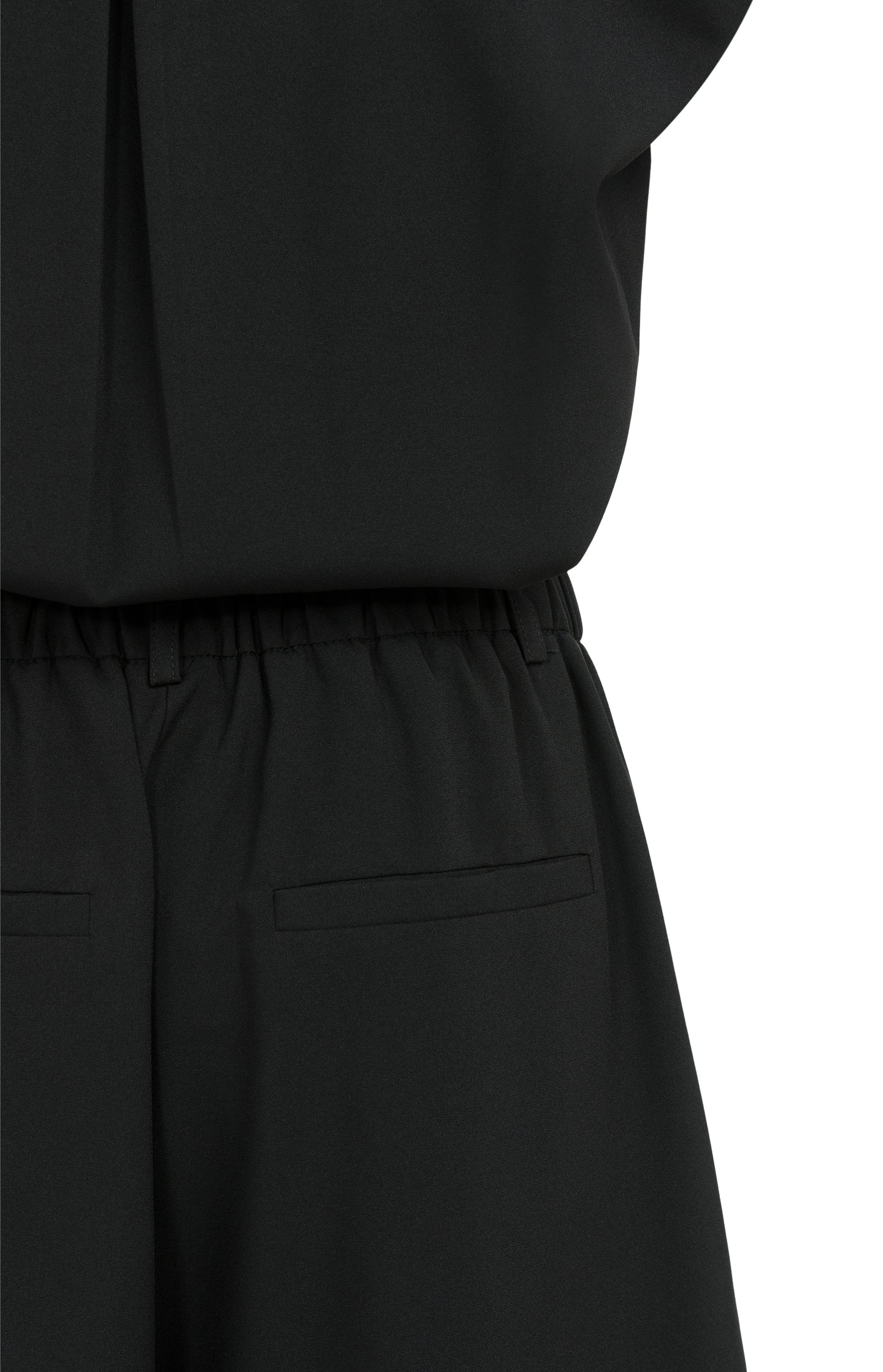 Sleeveless playsuit with wrap effect