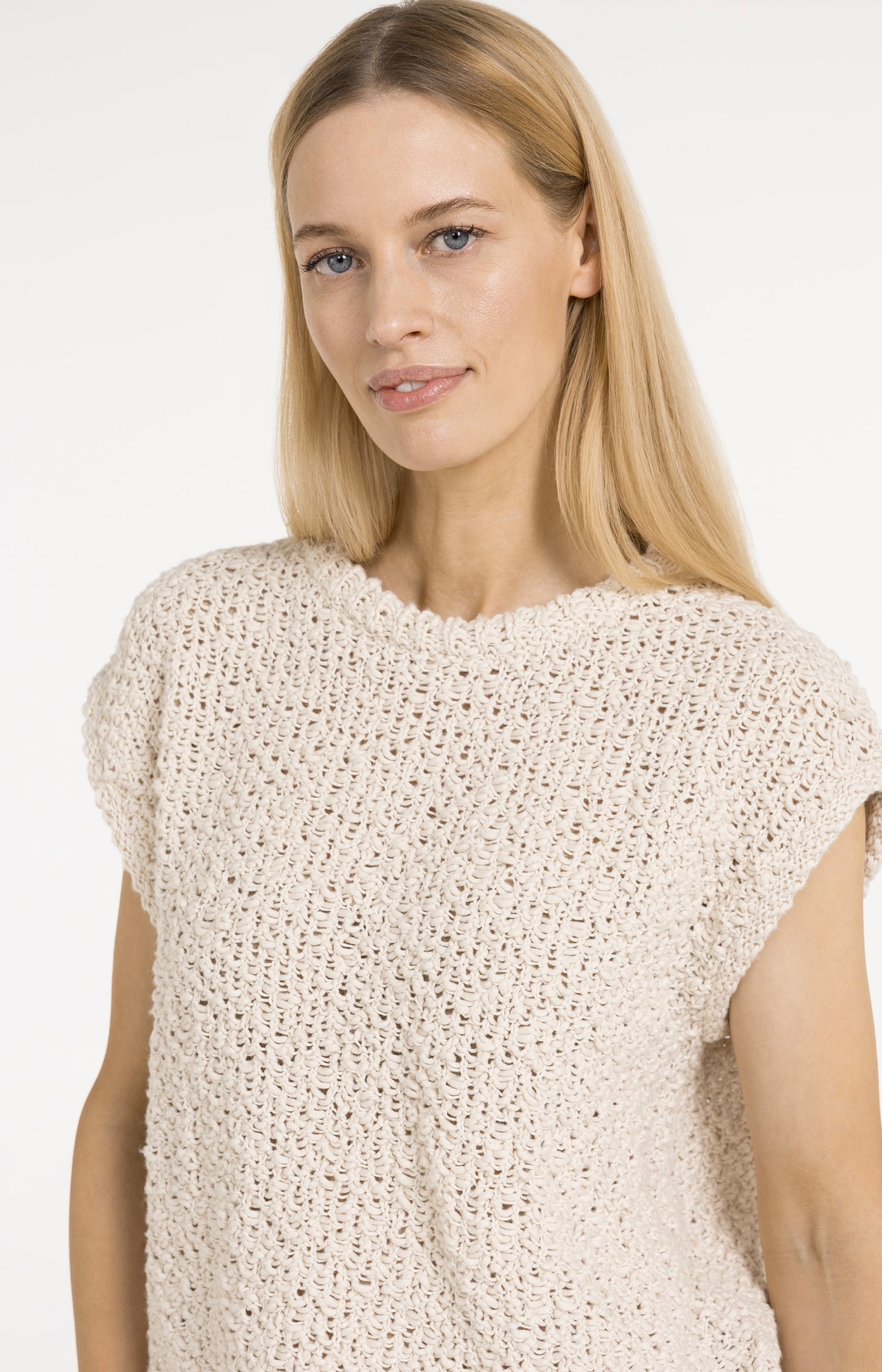 Sleeveless sweater with open-knit texture