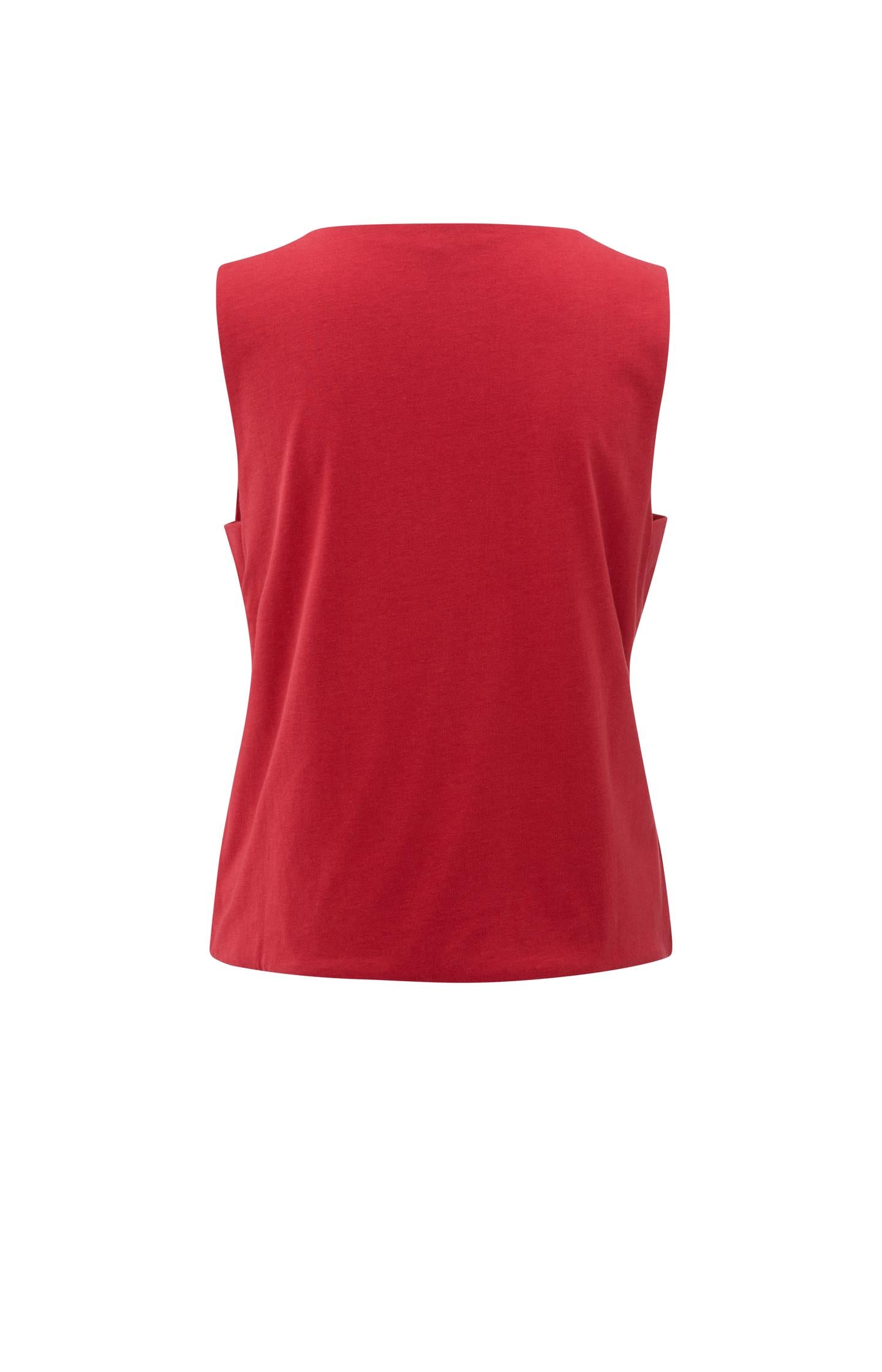 Sleeveless top with cut-out details at the sides