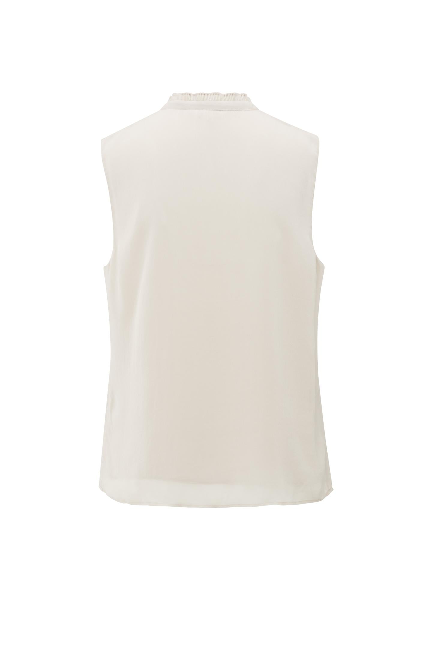 Sleeveless top with ruffled collar and keyhole detail