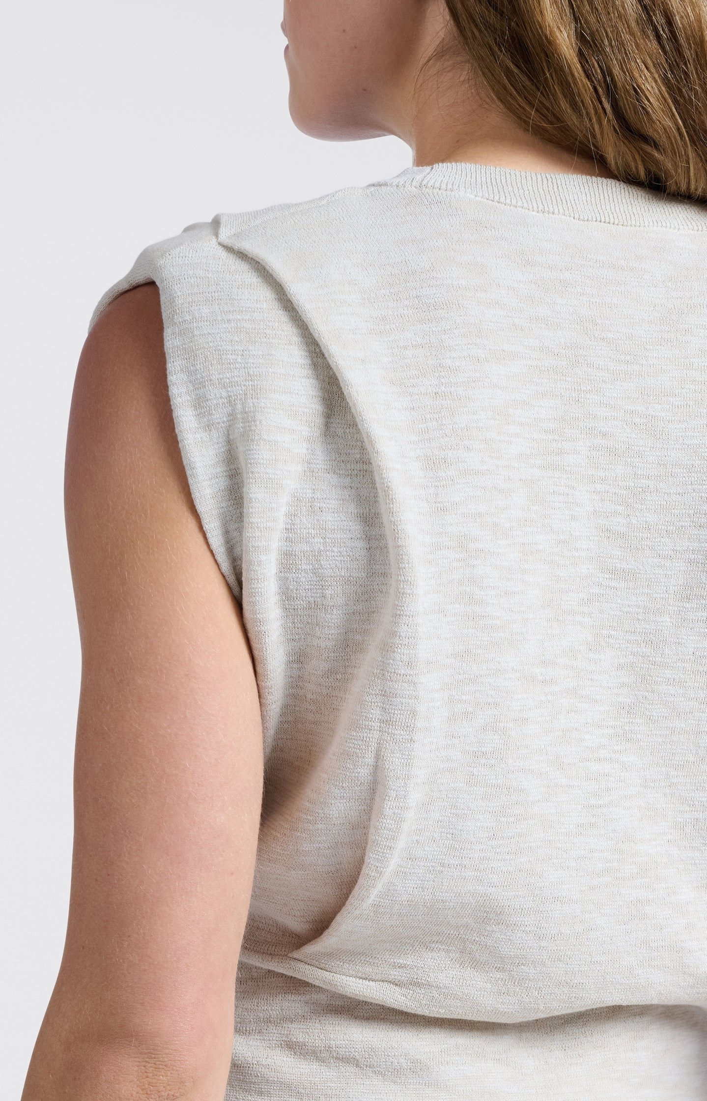 Sleeveless top with shoulder details