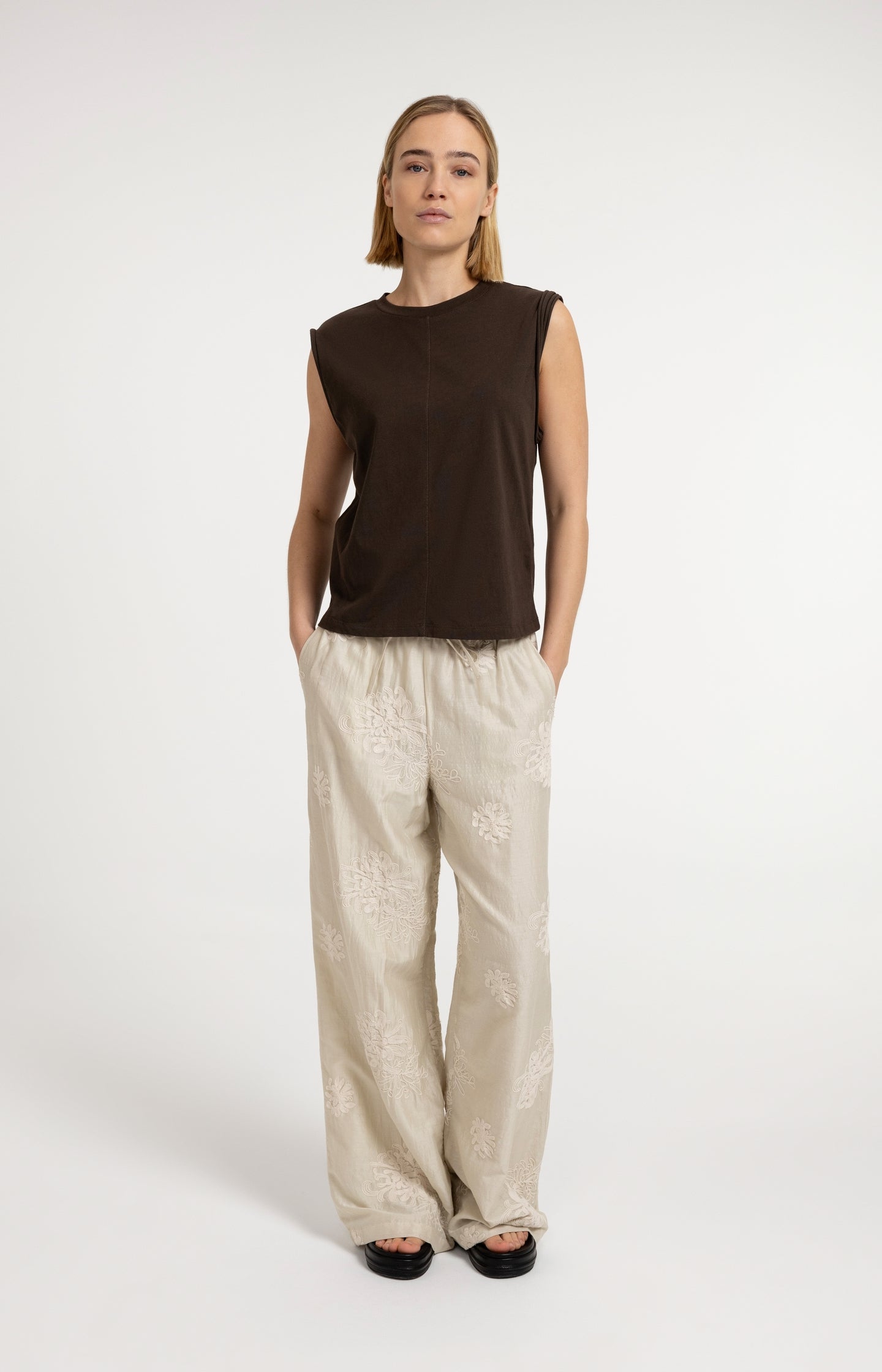 Sleeveless top with subtle sleeve details