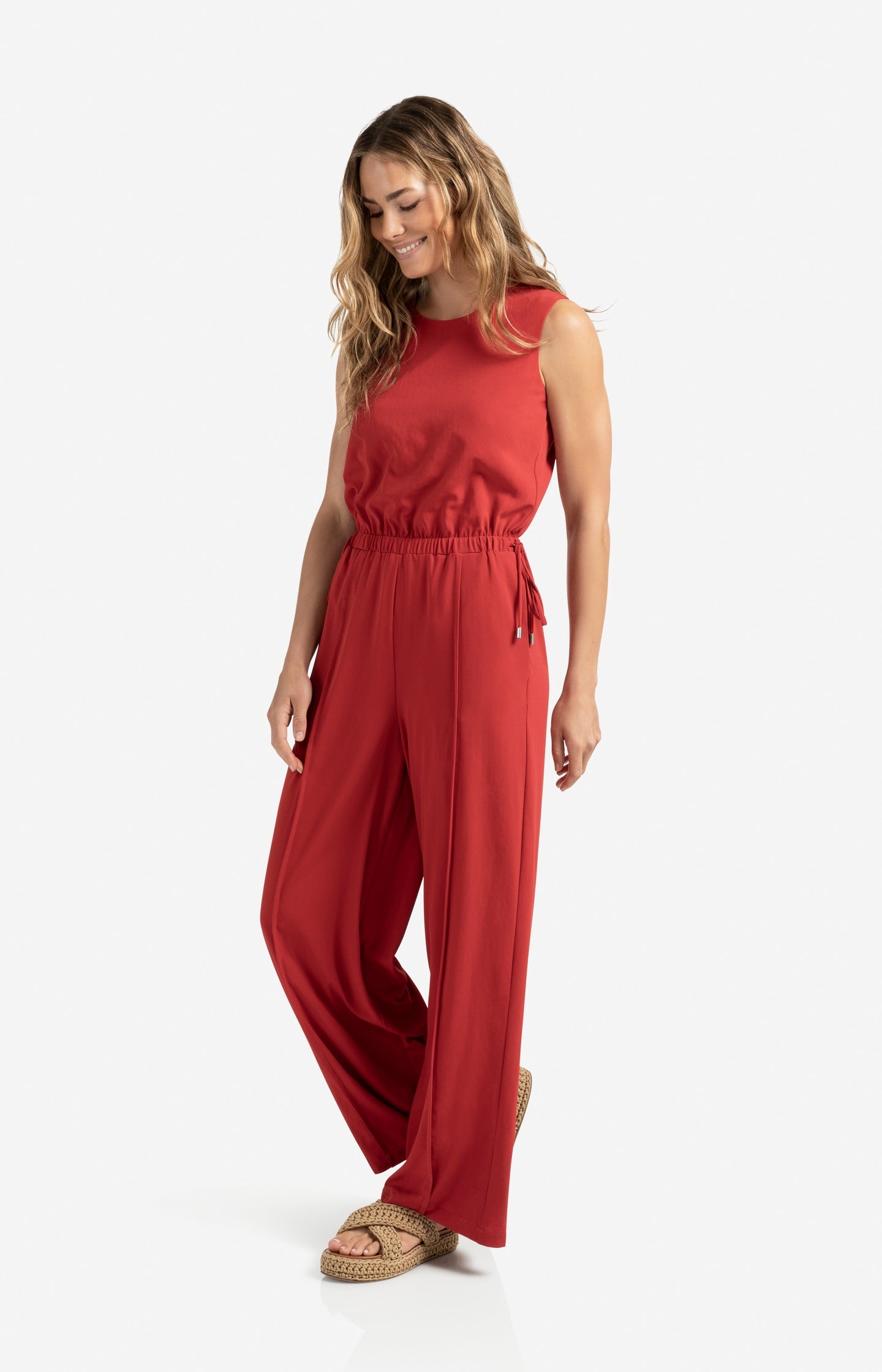 Sleeveless woven jumpsuit with cord detail
