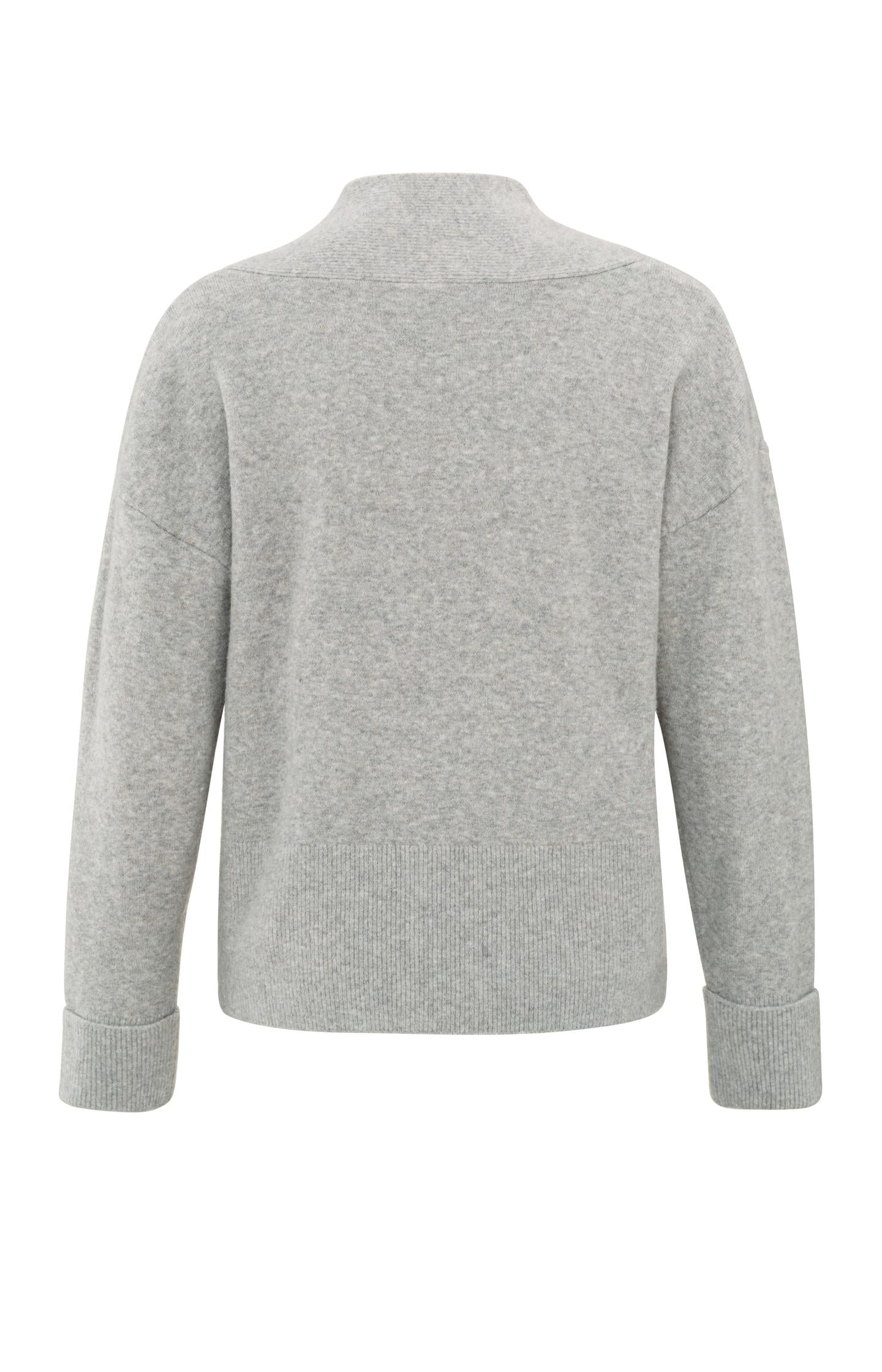 Soft sweater with deep V-neck and subtle rib details