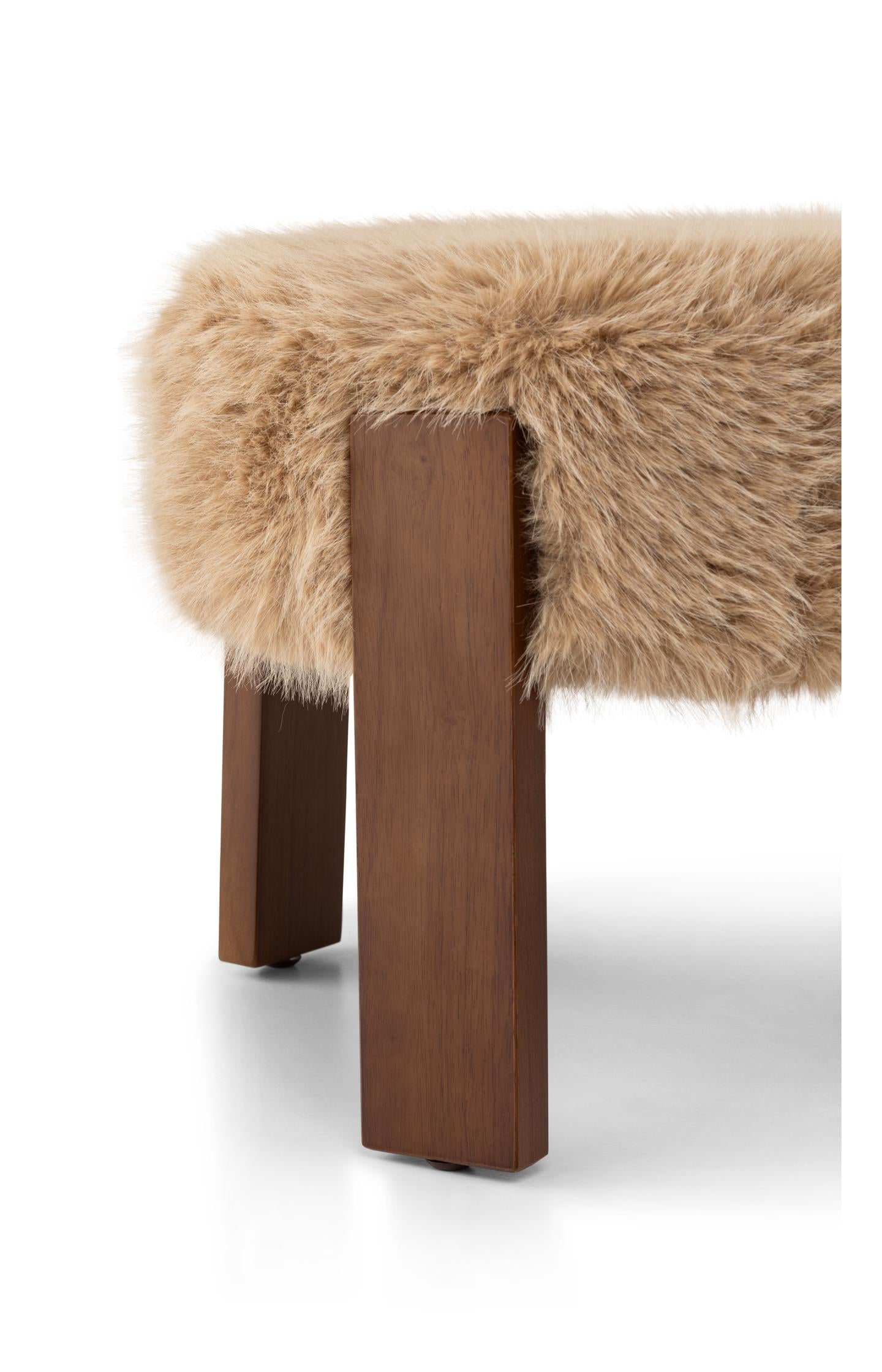 Stool with wooden legs and soft seat