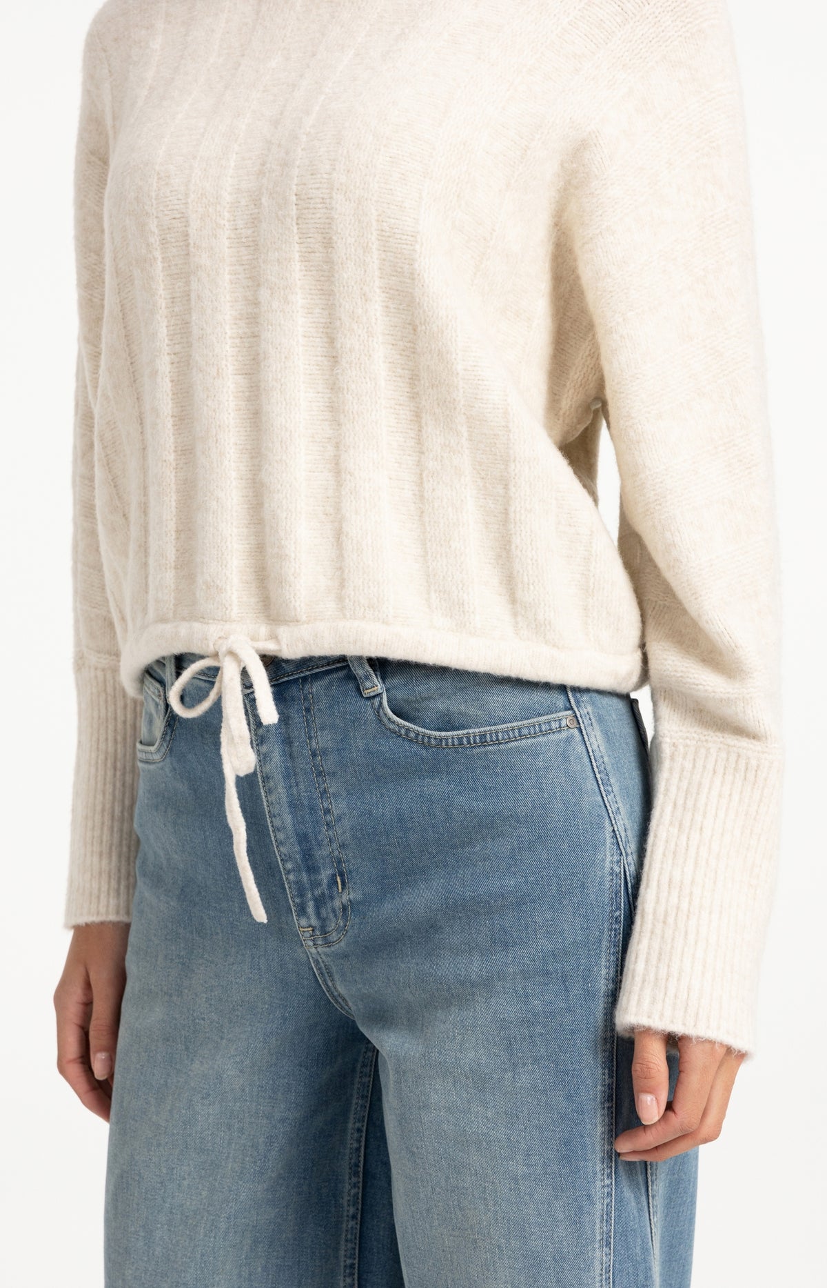 Sweater with batwing sleeves and drawcord at the hem