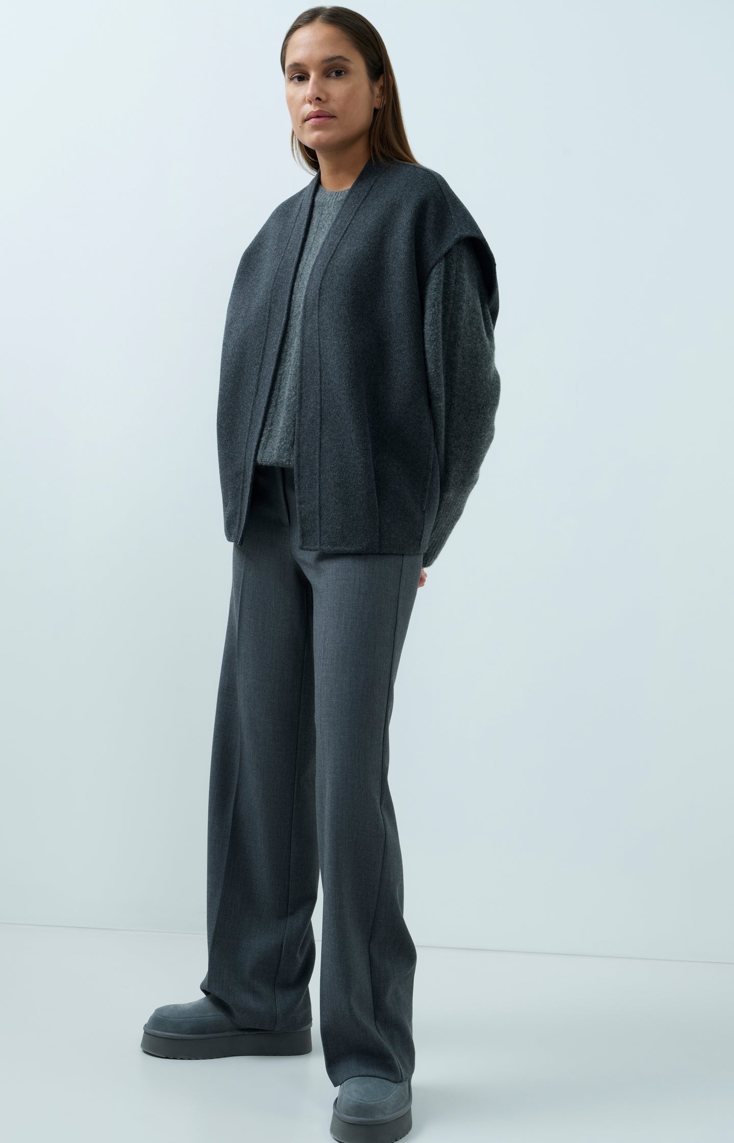 Sweater with batwing sleeves and drawcord at the hem