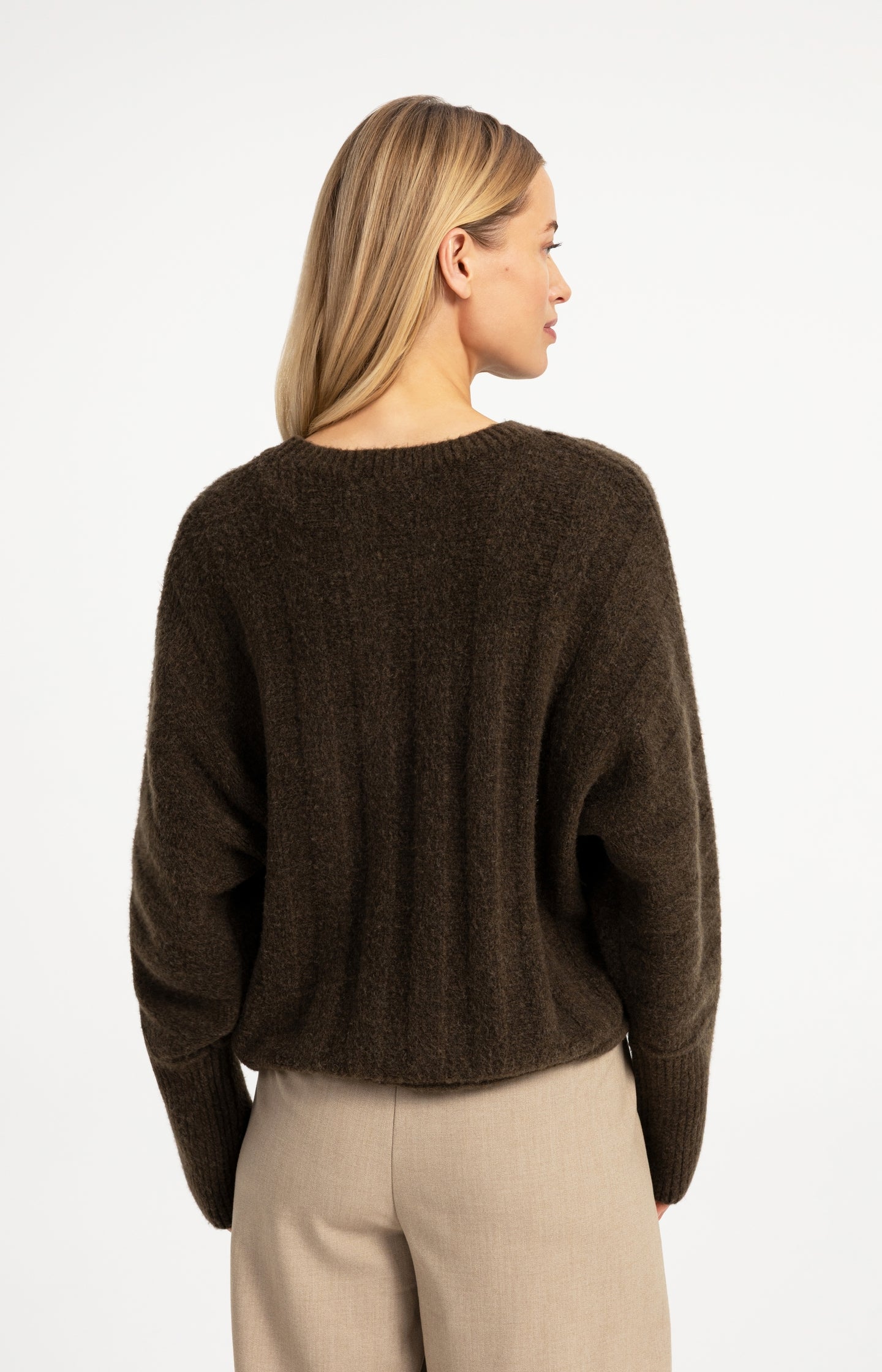 Sweater with batwing sleeves and drawcord at the hem