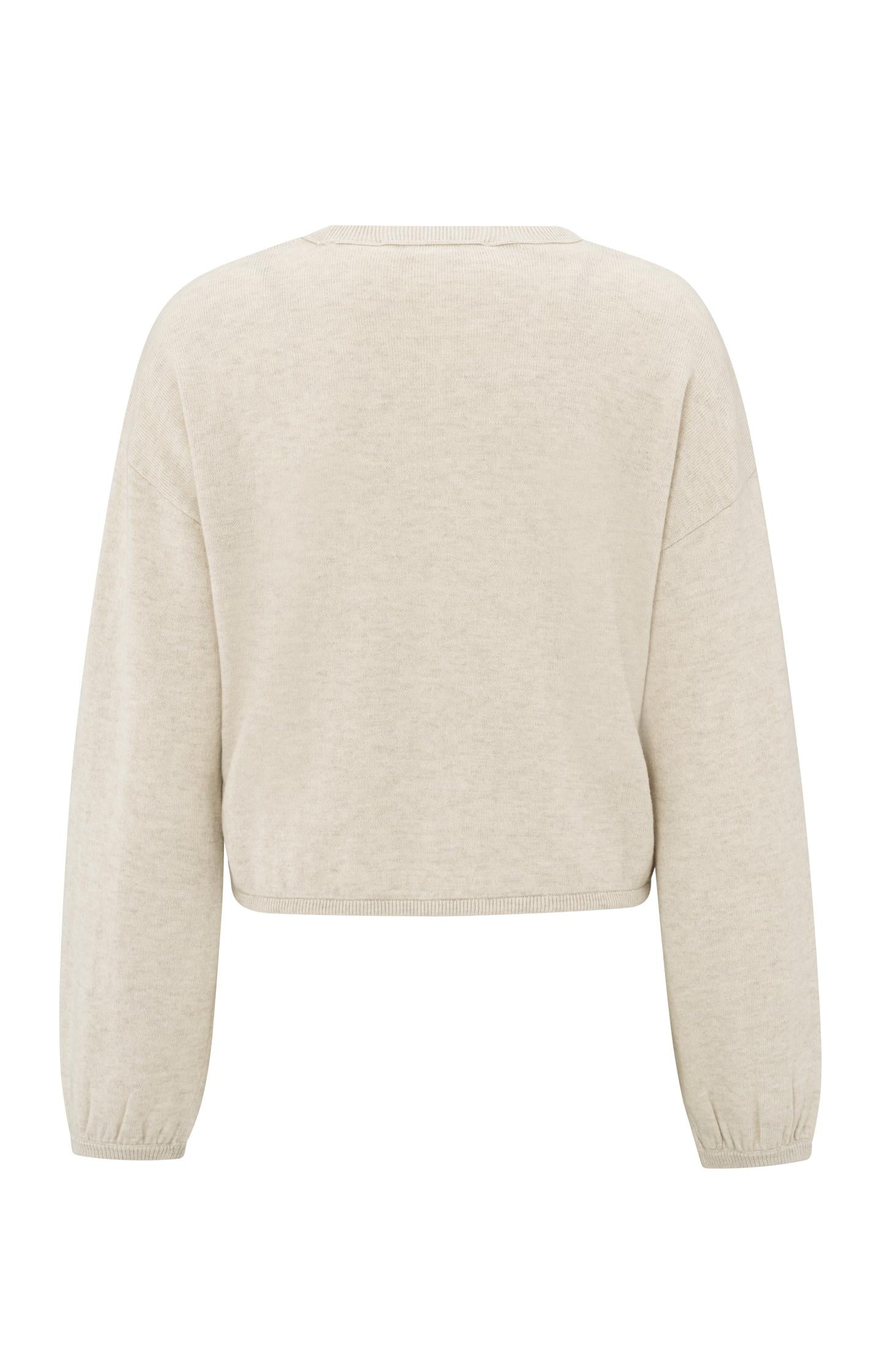 Sweater with corded hem and loose fit