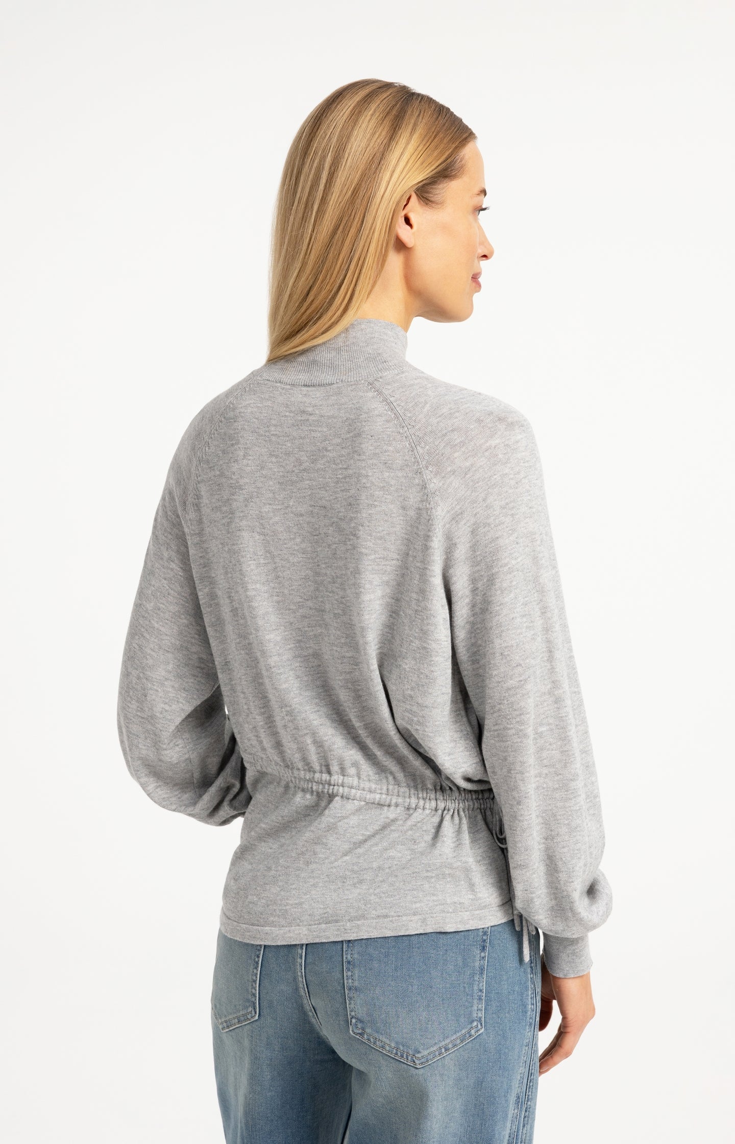 Sweater with high neckline and waist cord