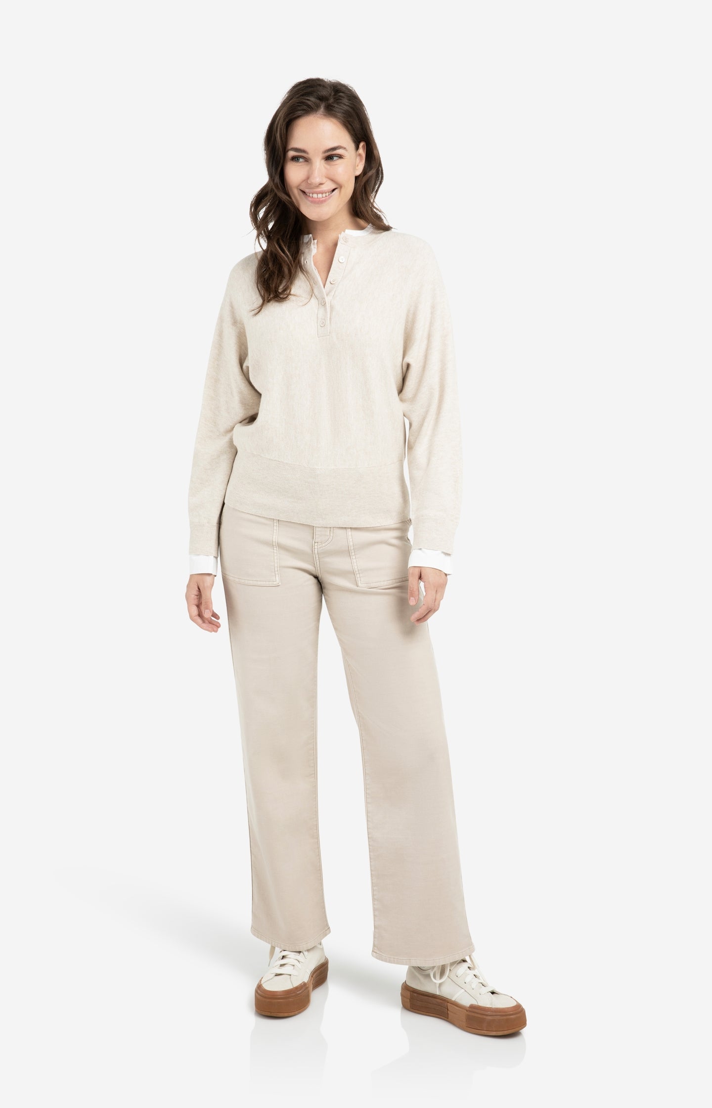 Sweater with inserted blouse collar and button detail