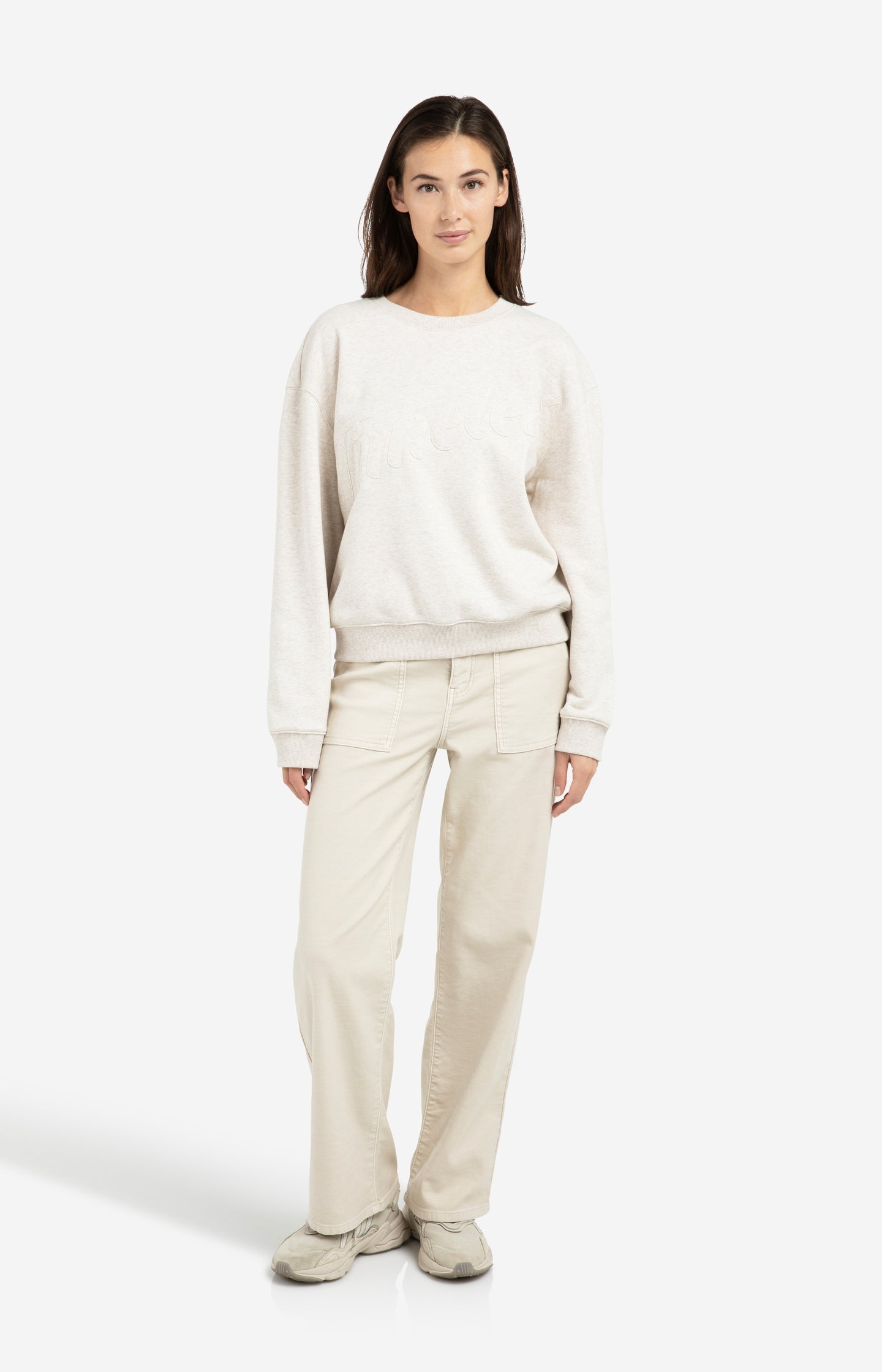 Sweater with stitched-on text and round neckline