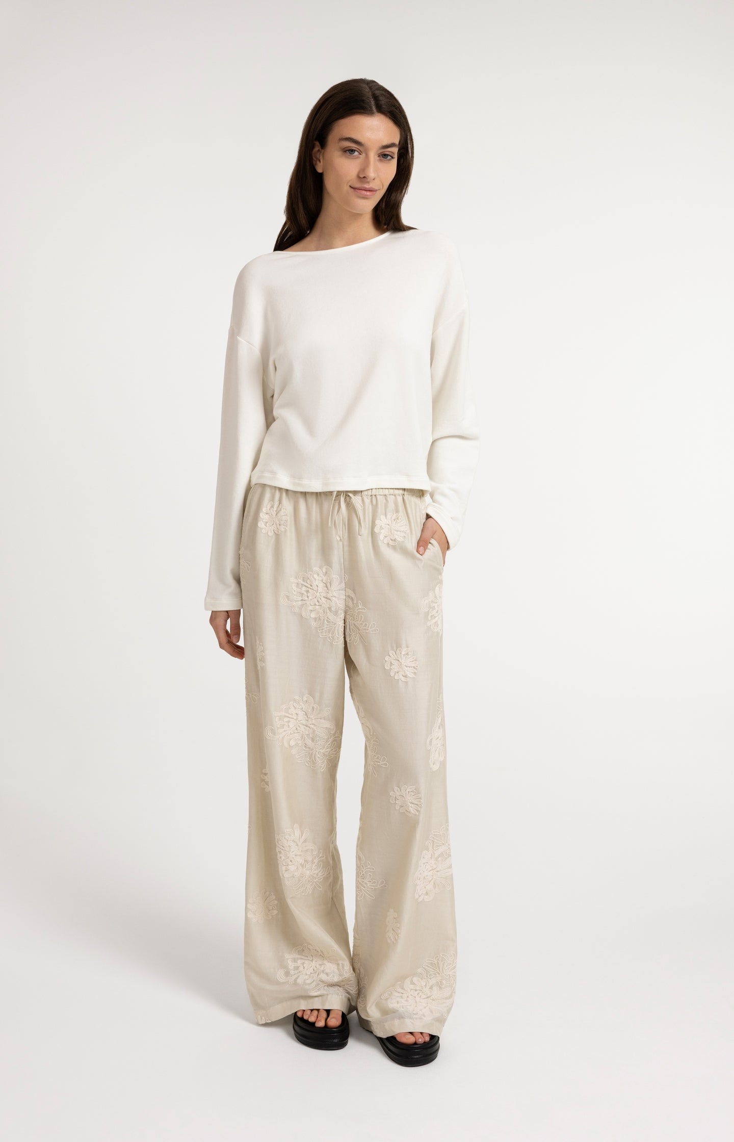 Sweater with V-neck and twisted detail at the back