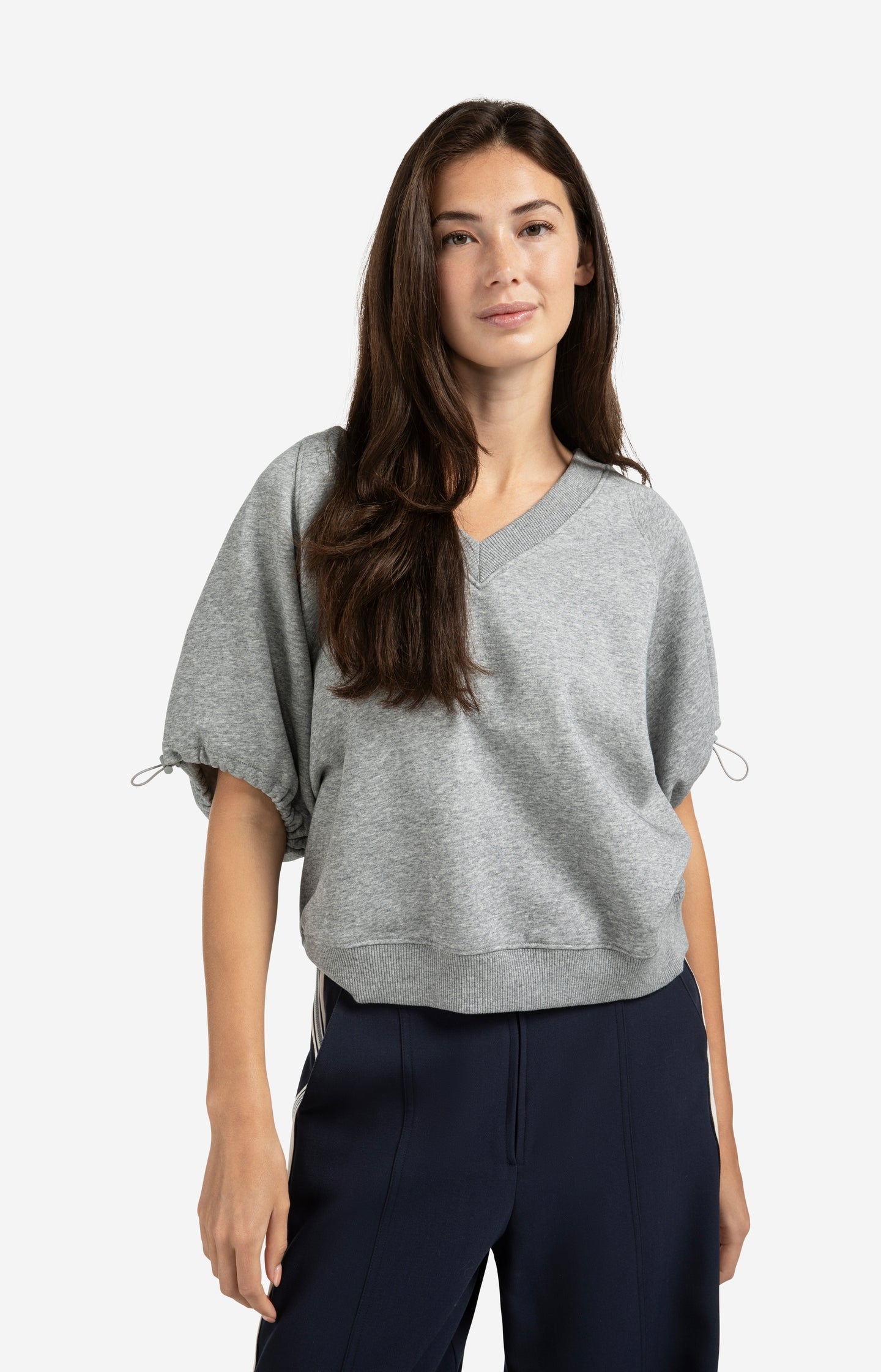 Sweatshirt with V-neck and adjustable sleeve cords