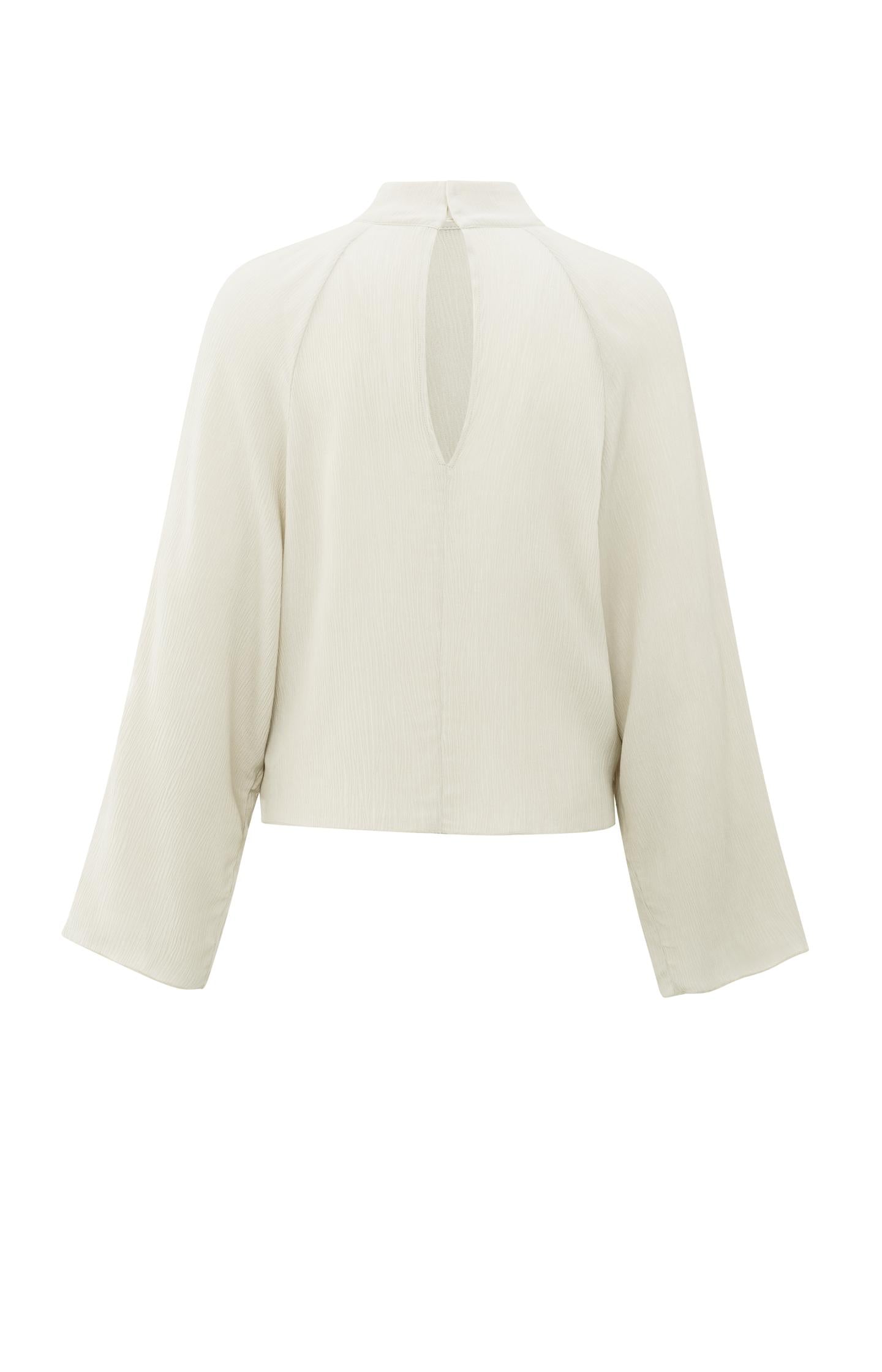 Textured top with high neck and raglan sleeves