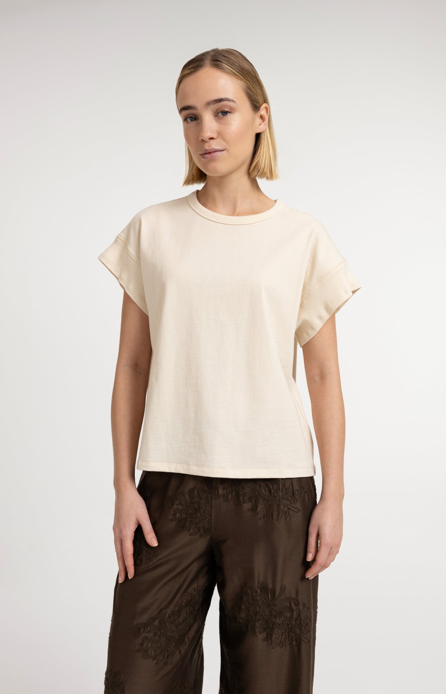 Top with decorative cuffs