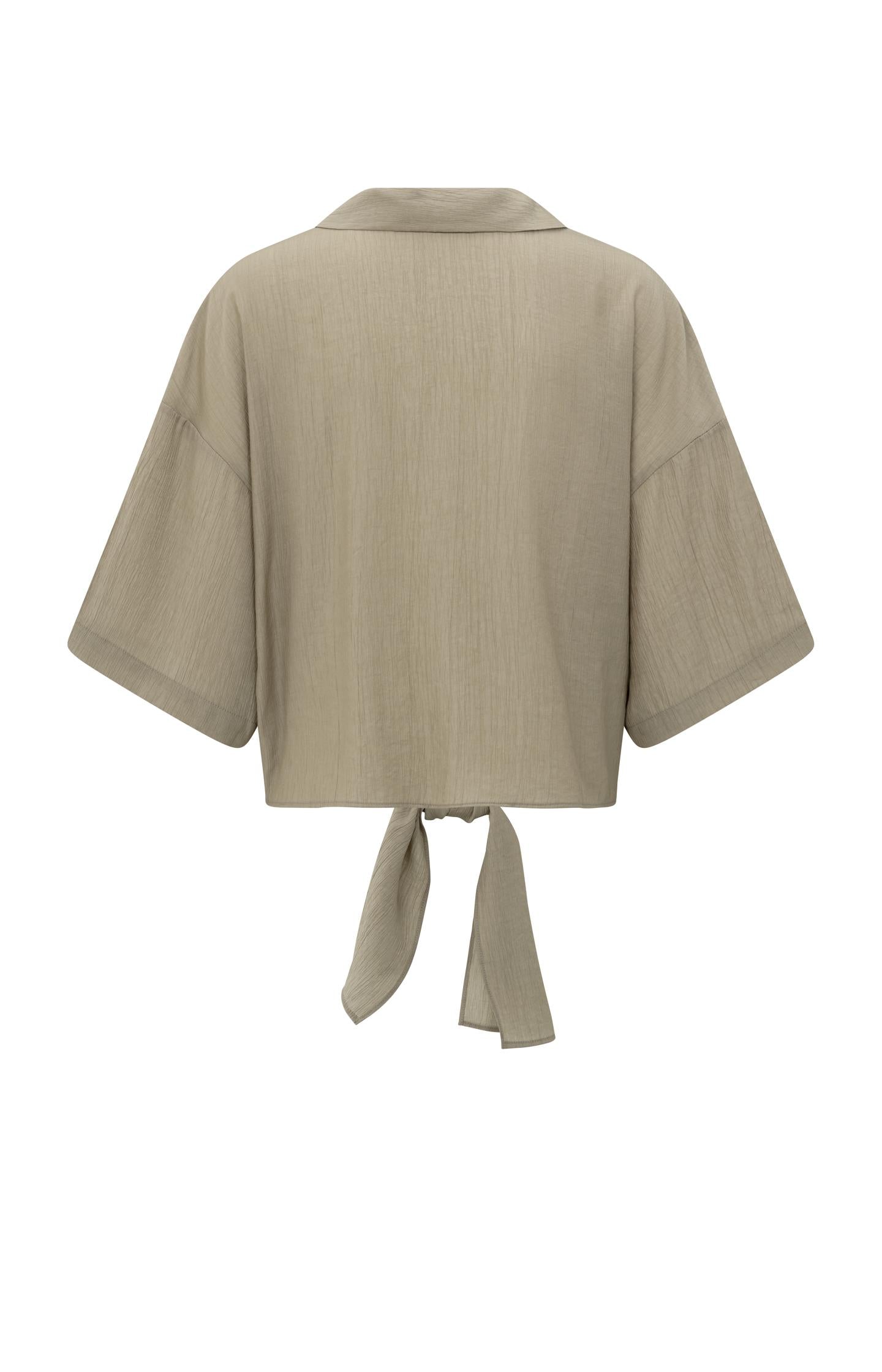 Top with knotted detail and wide sleeves