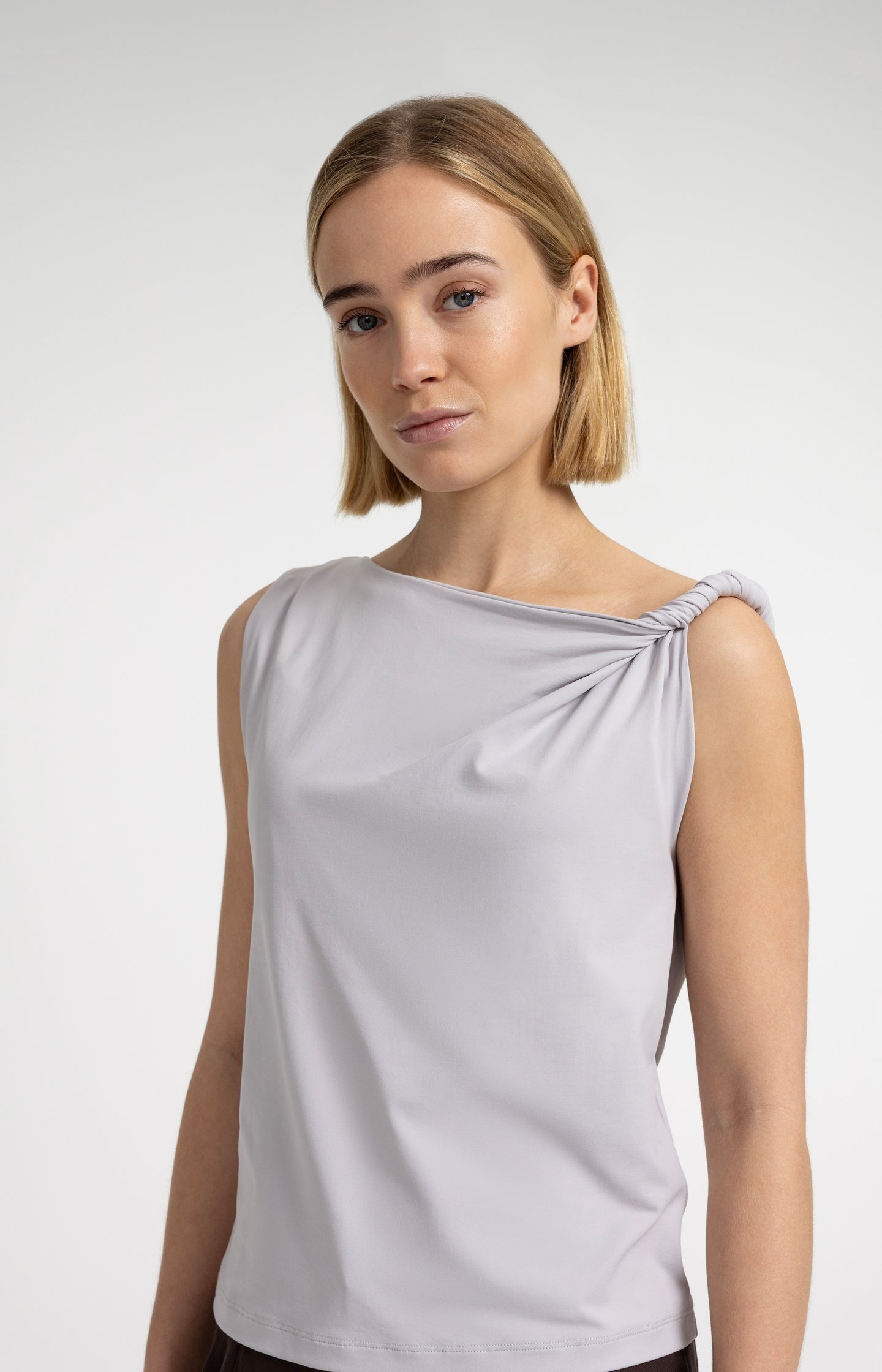 Top with twisted shoulder strap
