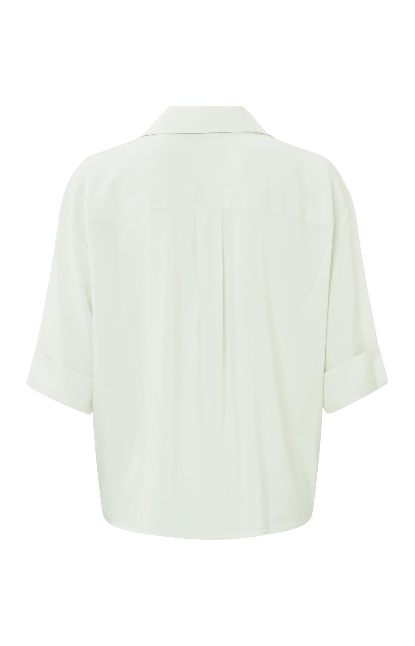 Top with V-neck, 3/4 length sleeves and draped details