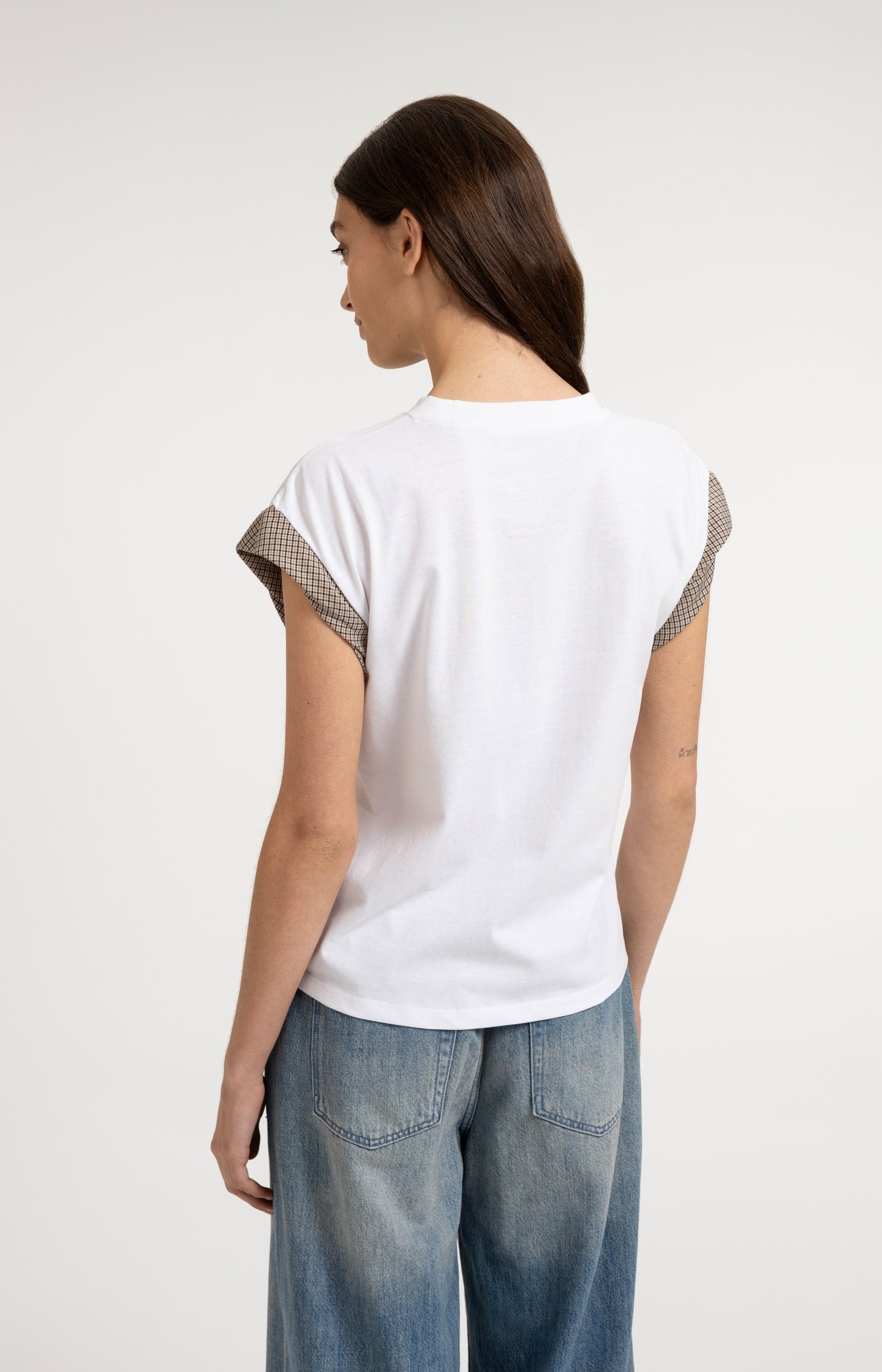 Top with woven cuff details