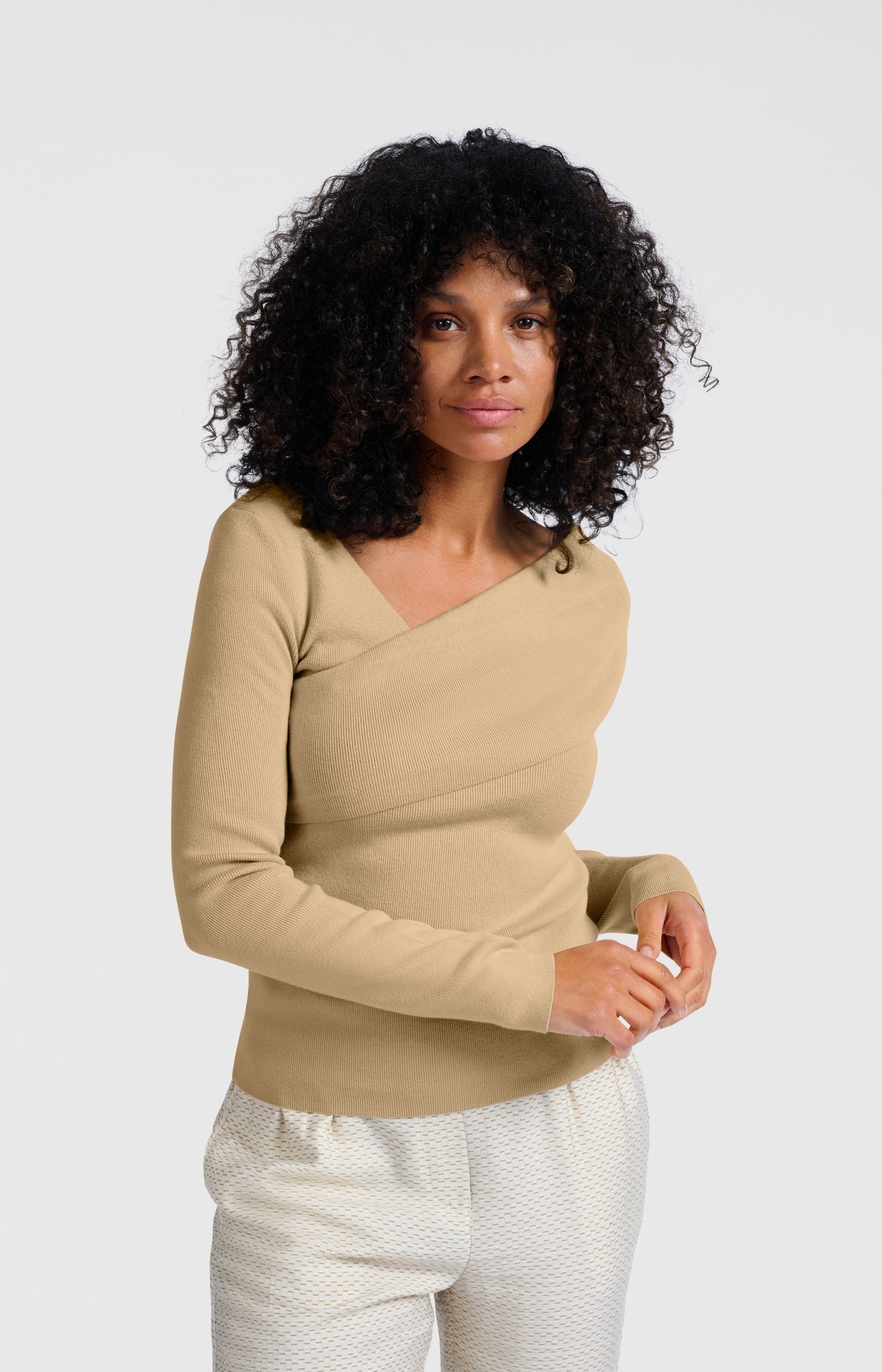 Top with wrap-over neckline