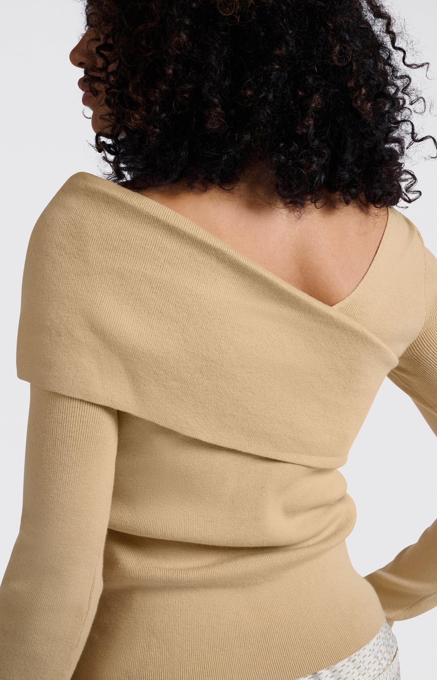 Top with wrap-over neckline