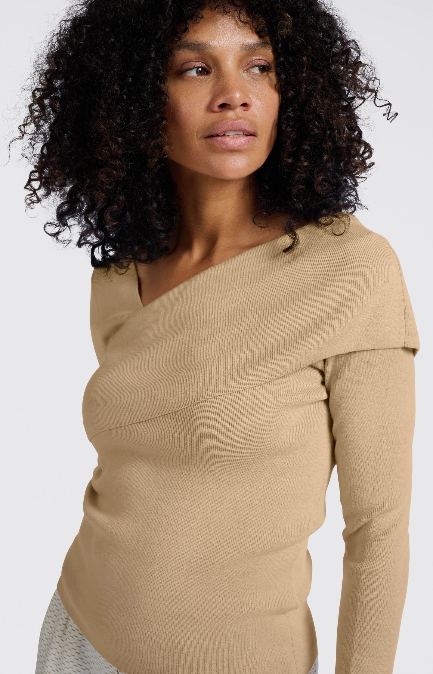 Top with wrap-over neckline